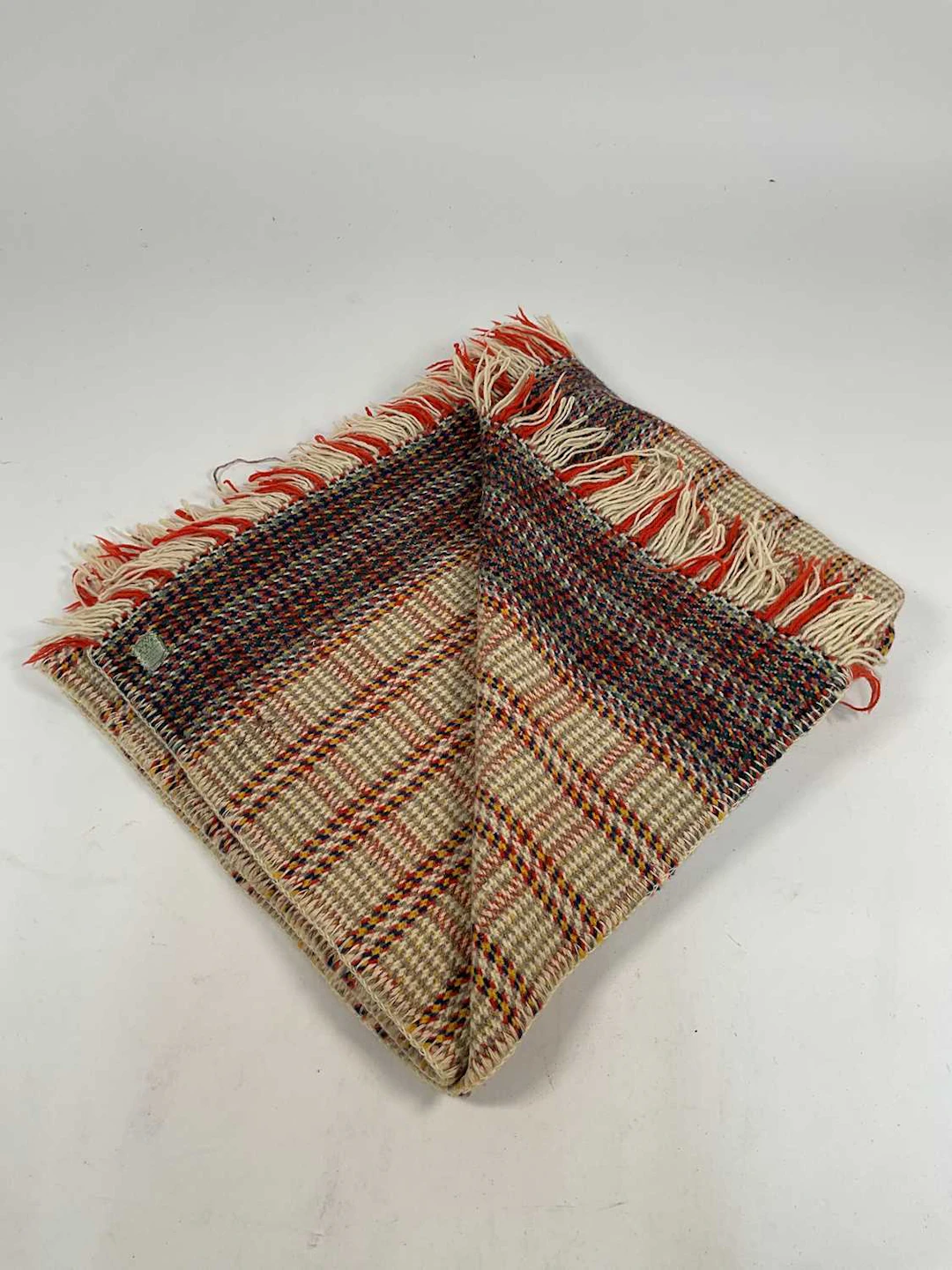 ESGAIR MOEL WOOLLEN MILL; a multi coloured plaid woollen...
