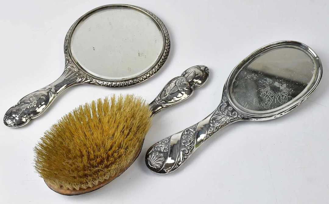 Three late 19th early 20th century hallmarked silver dressing table items