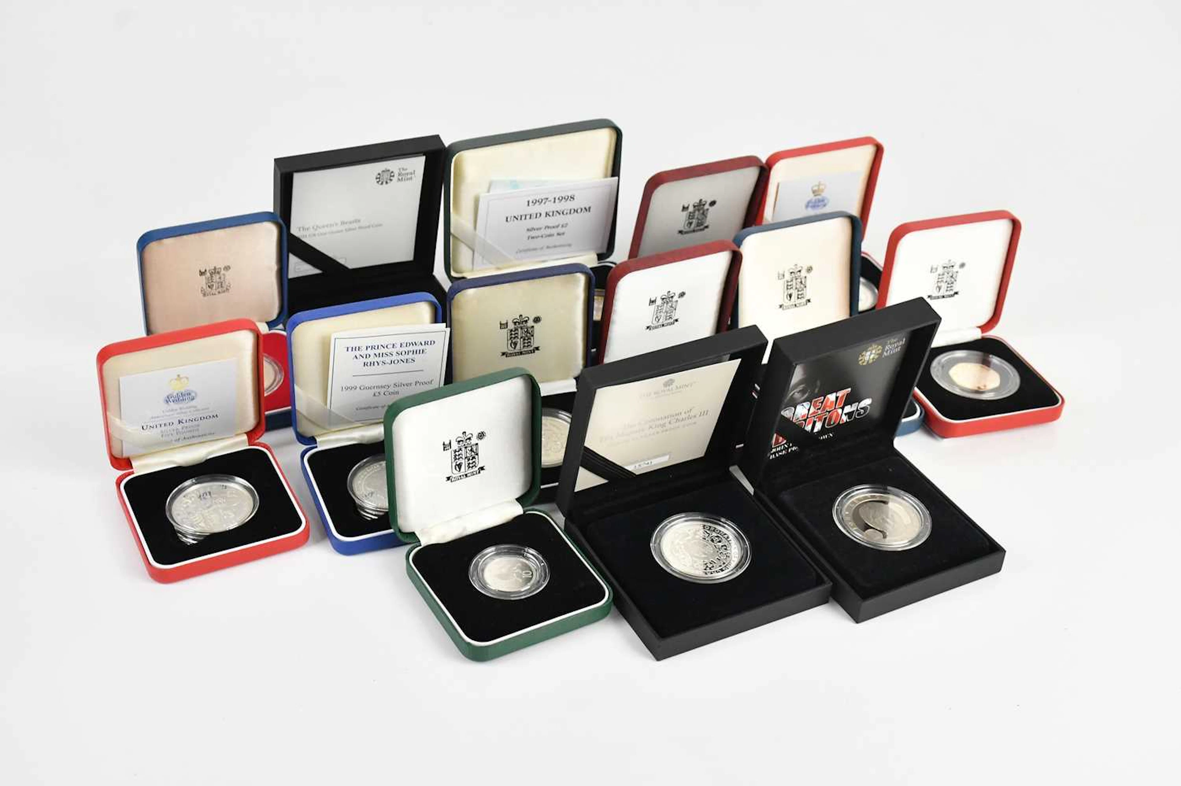 A collection of commemorative silver coins