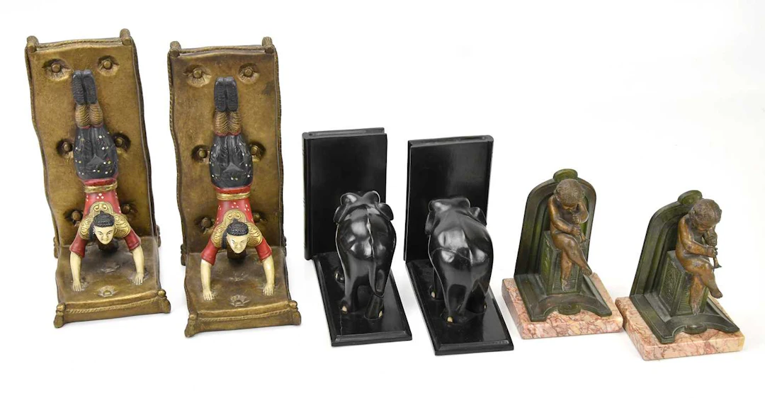 A pair of bronzed spelter bookends