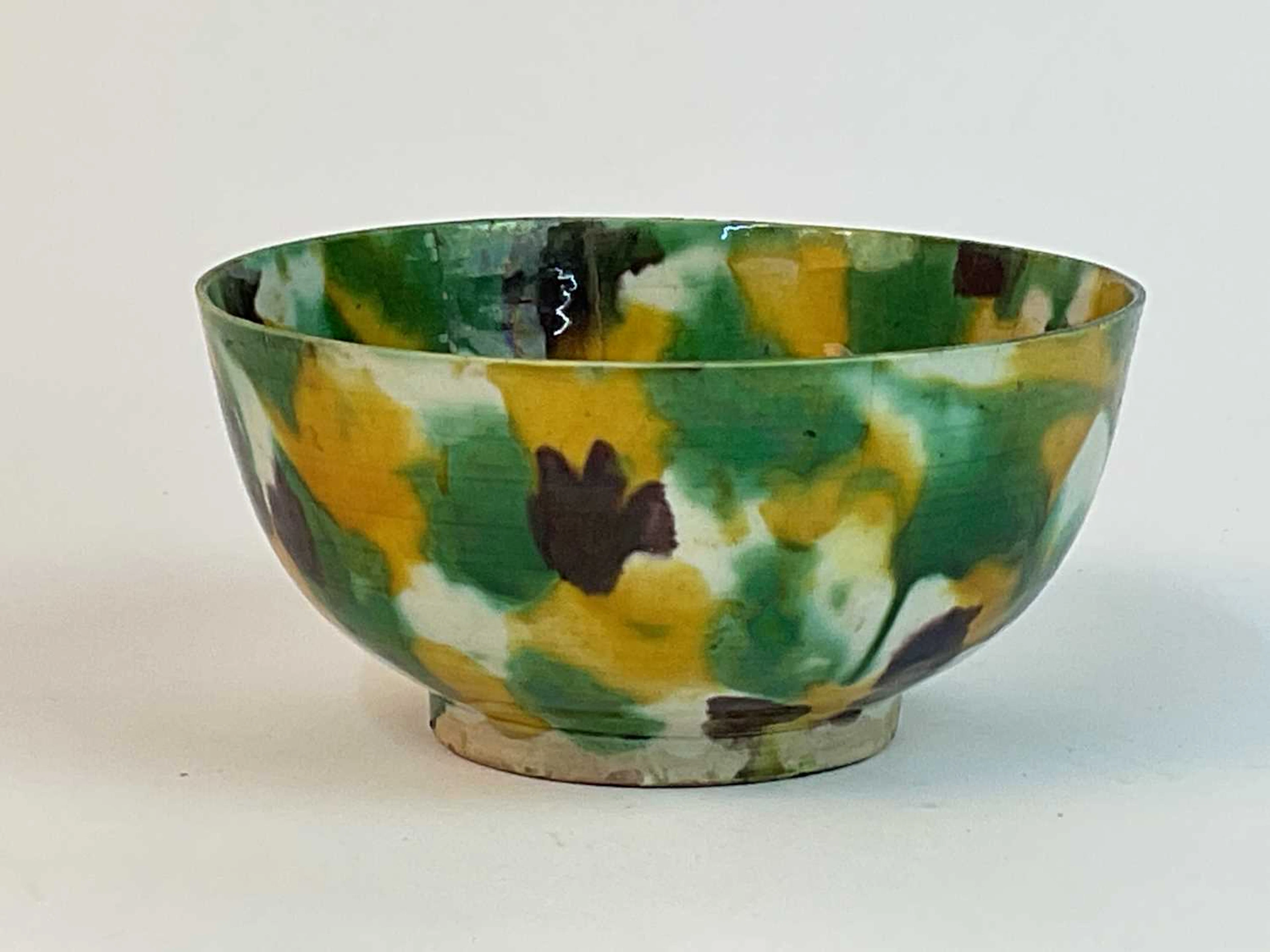A Chinese Sancai glazed footed bowl