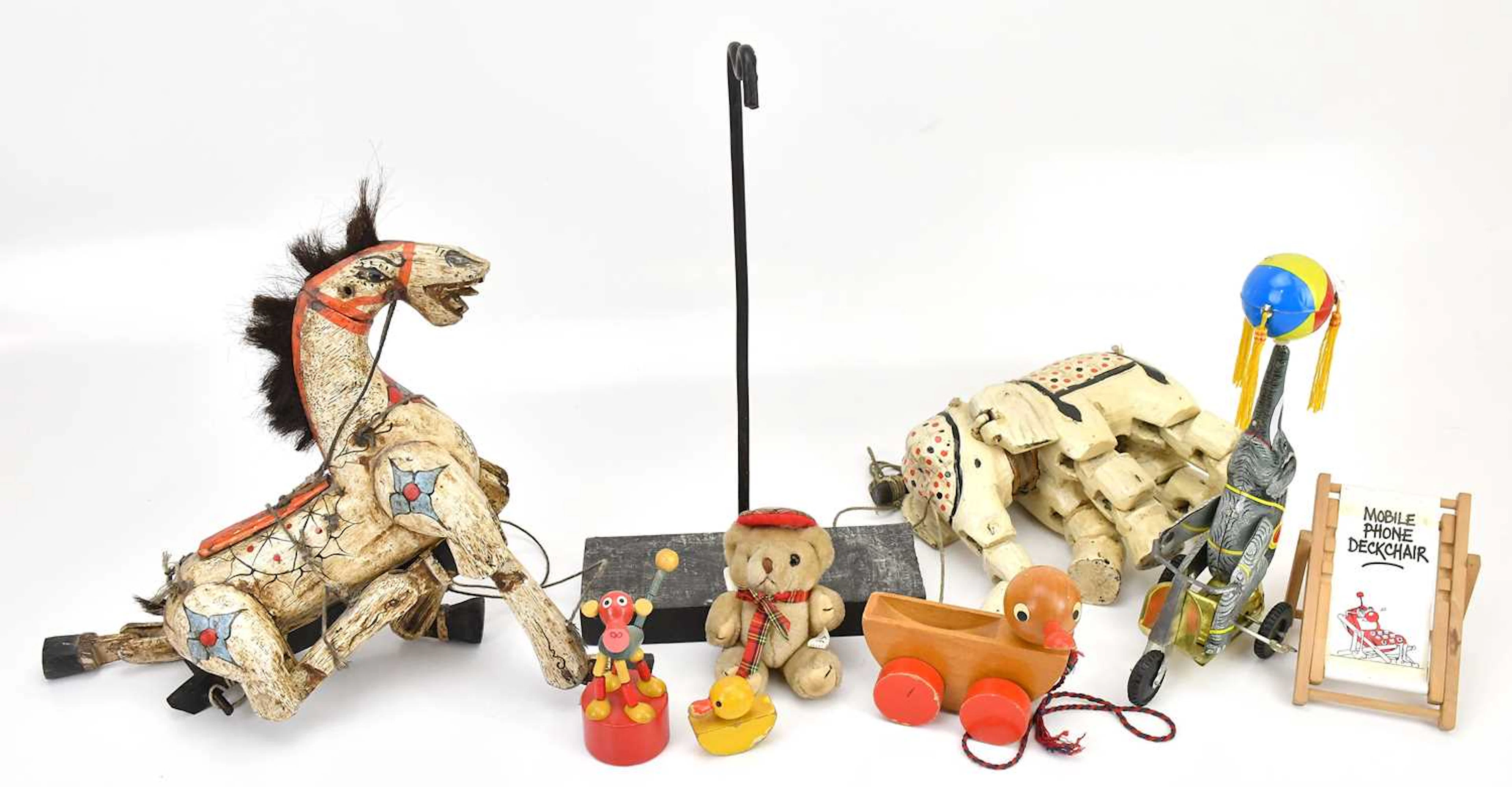 Two carved and painted wood puppets