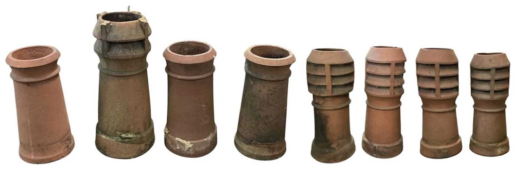 Eight assorted Victorian and later terracotta chimney pots