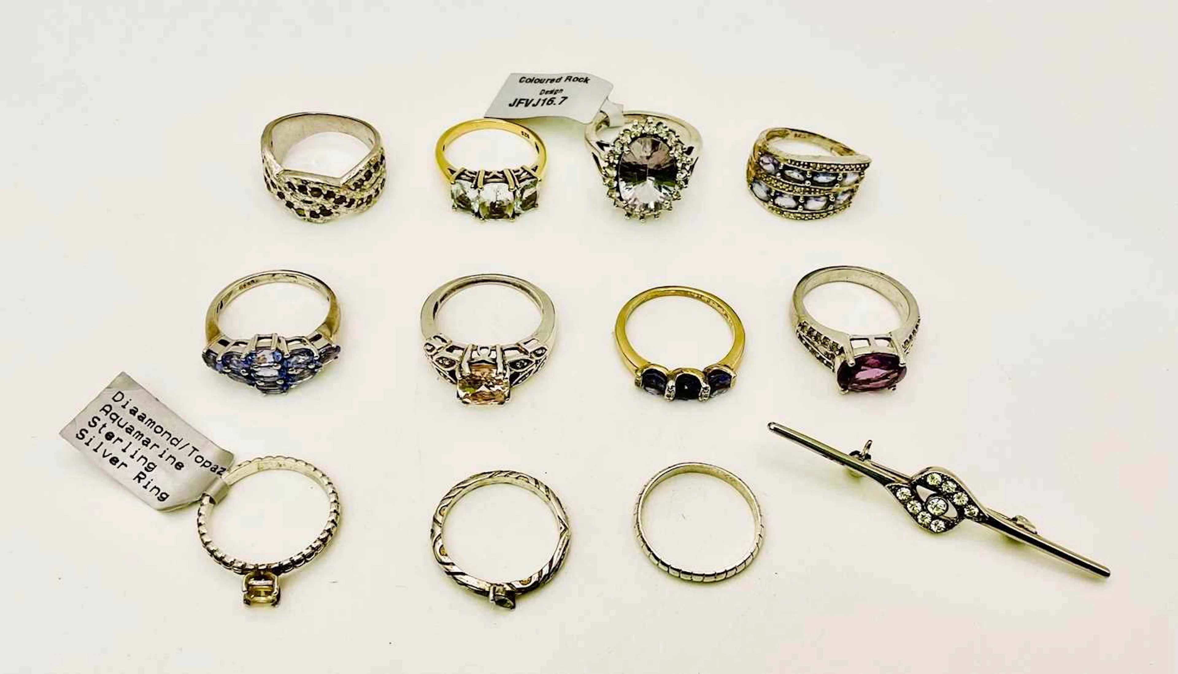 A collection of silver dress rings