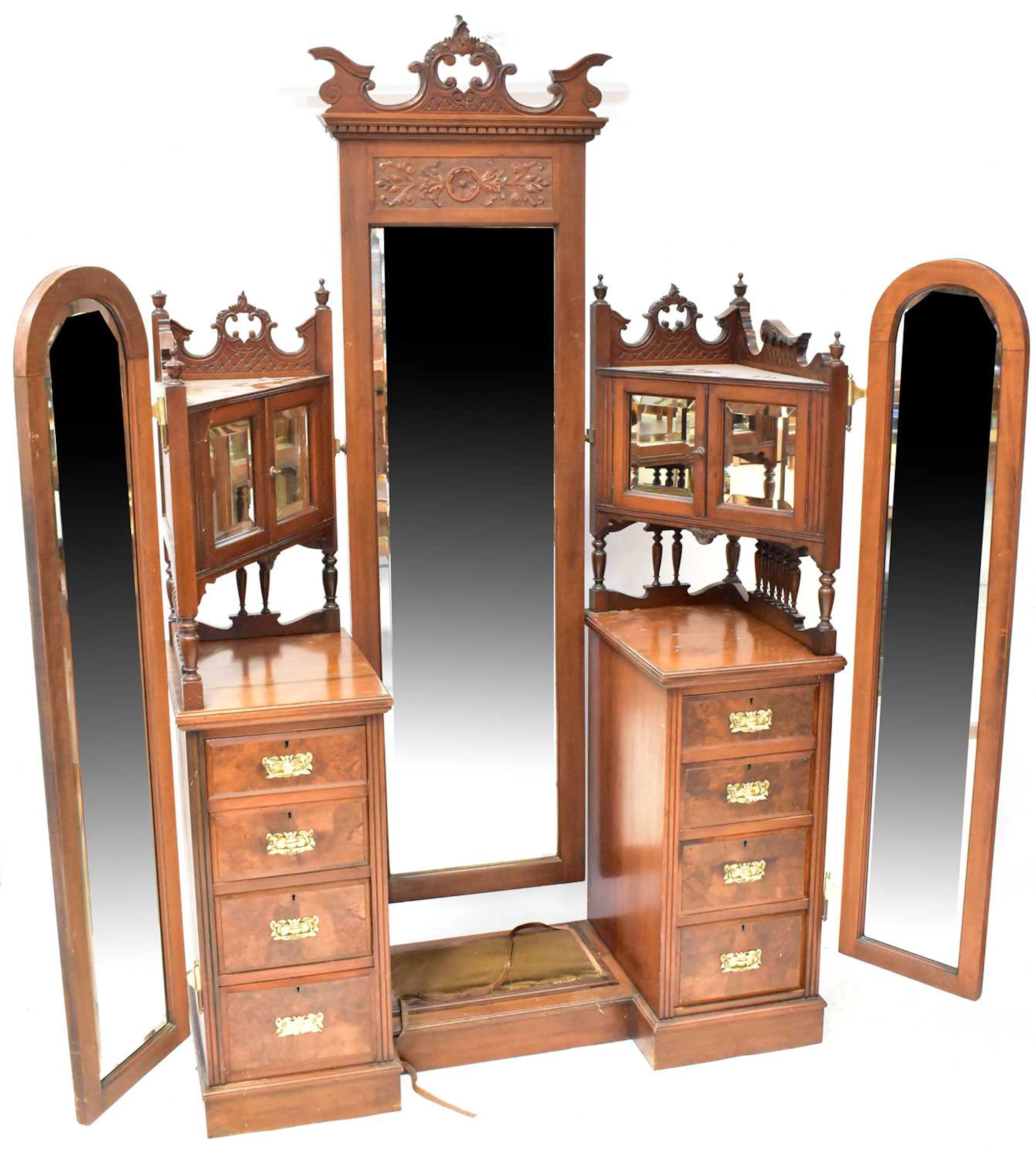 A late Victorian walnut triple mirror dressing table