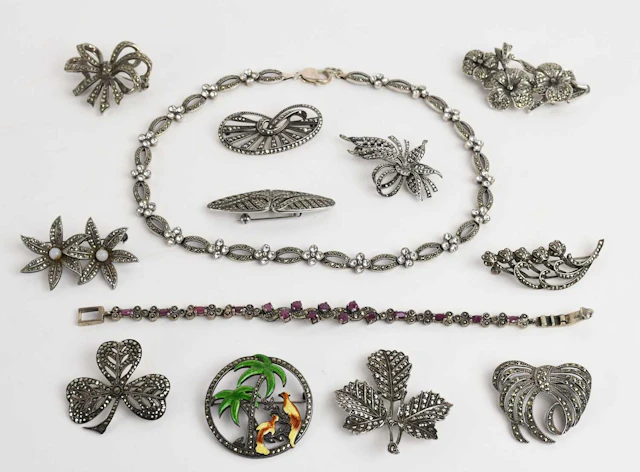 A quantity of assorted 925 silver enamelled and marcasite set costume jewellery