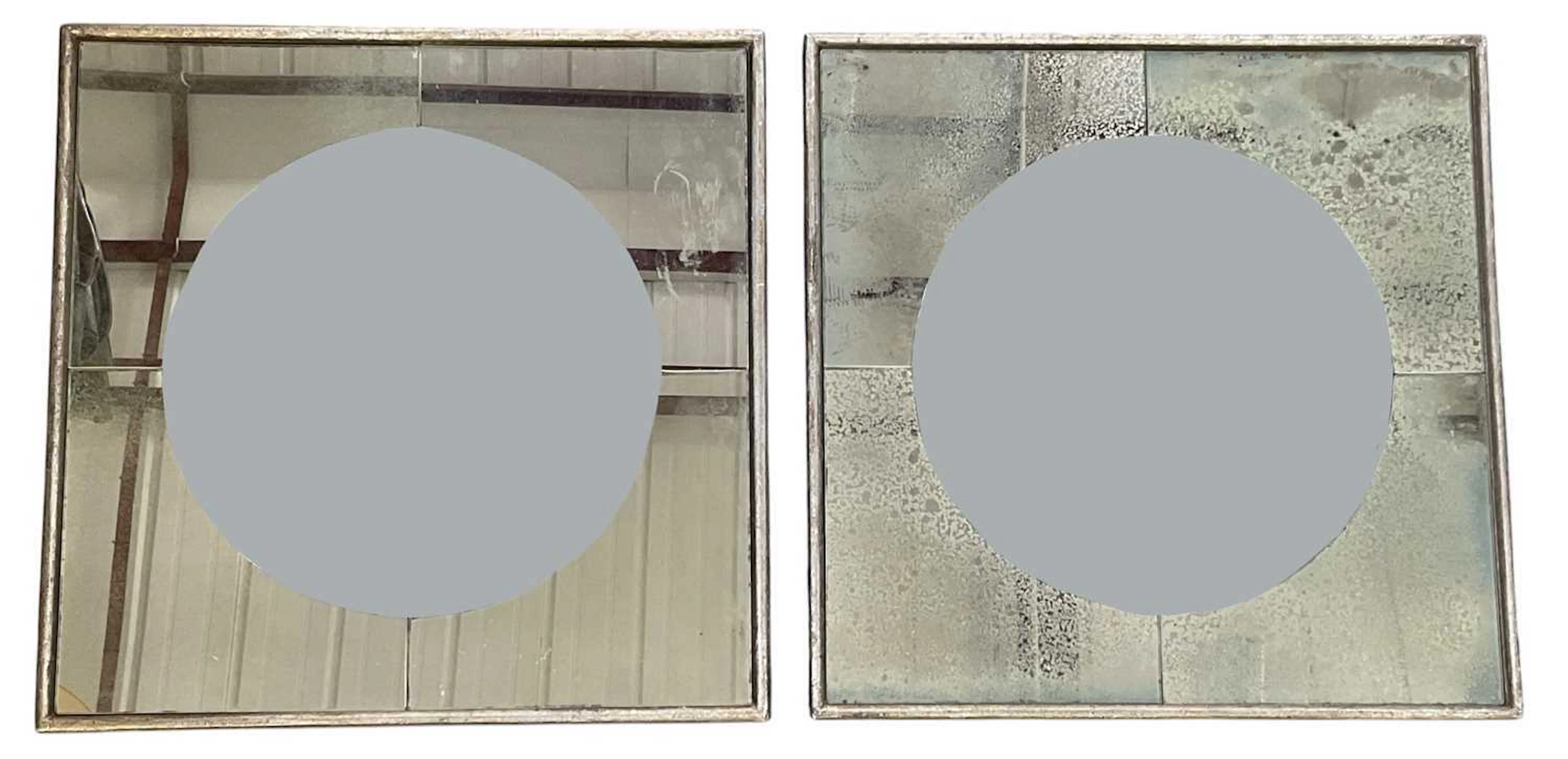 A pair of modern contemporary square convex wall mirrors