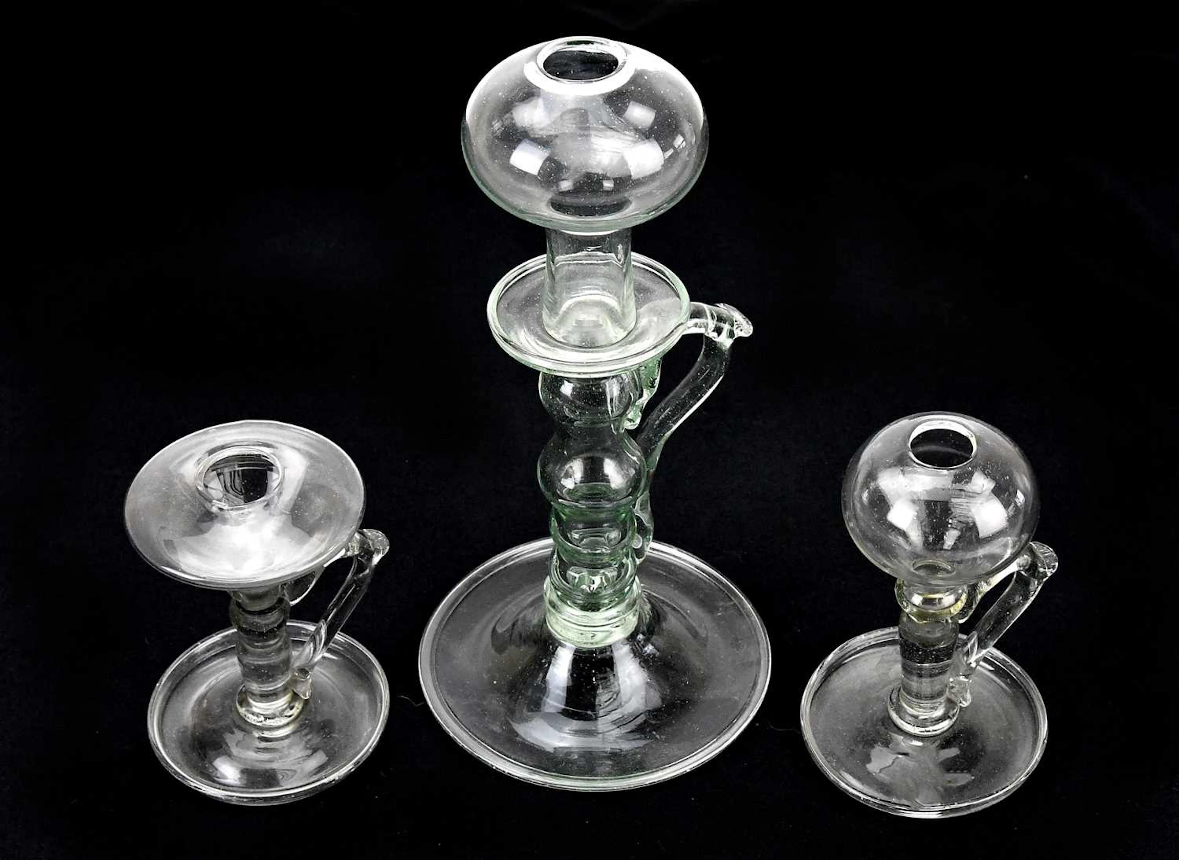Three 19th century glass lace maker's lamps