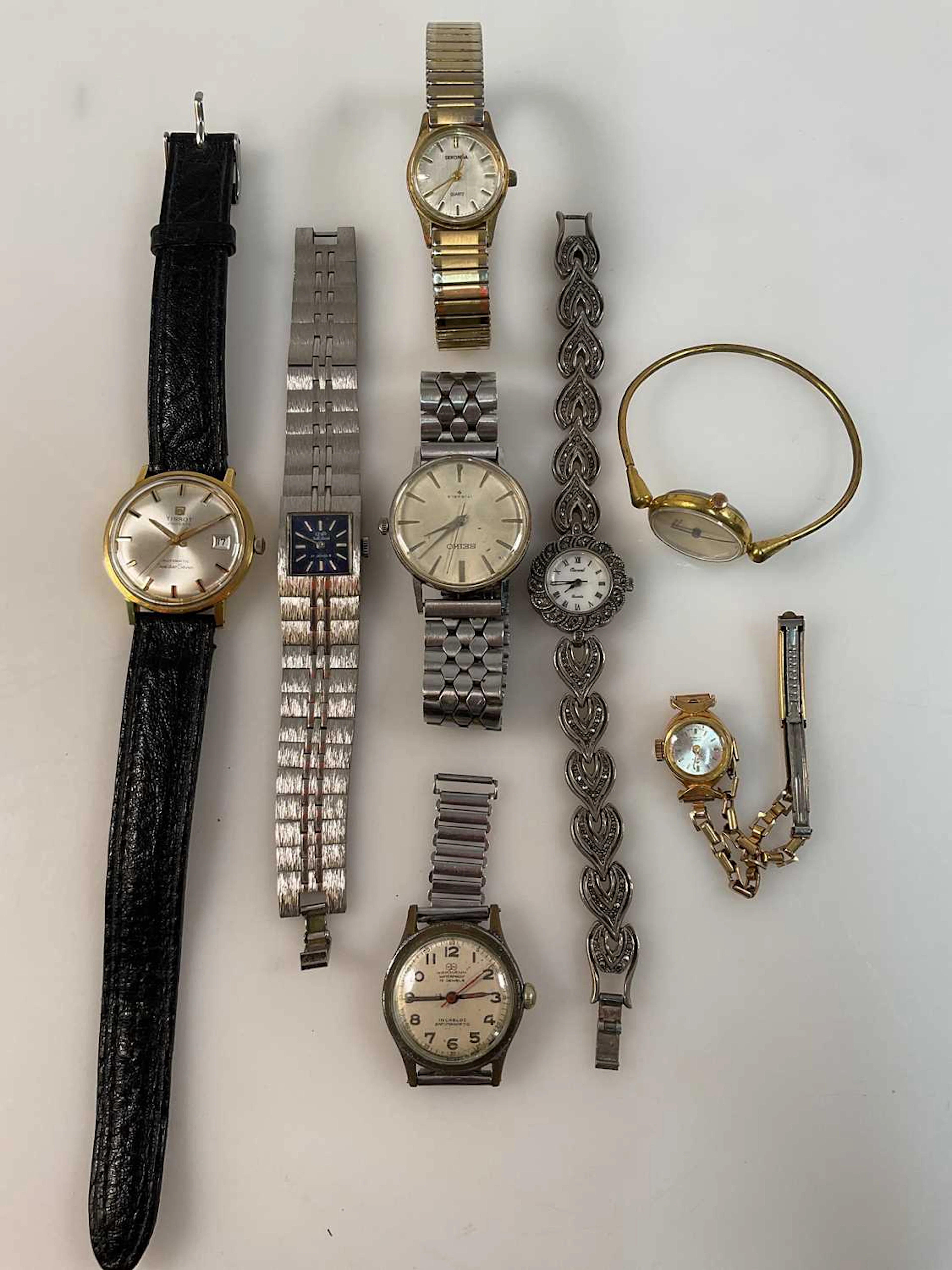 A collection of eight gentleman's and lady's watches