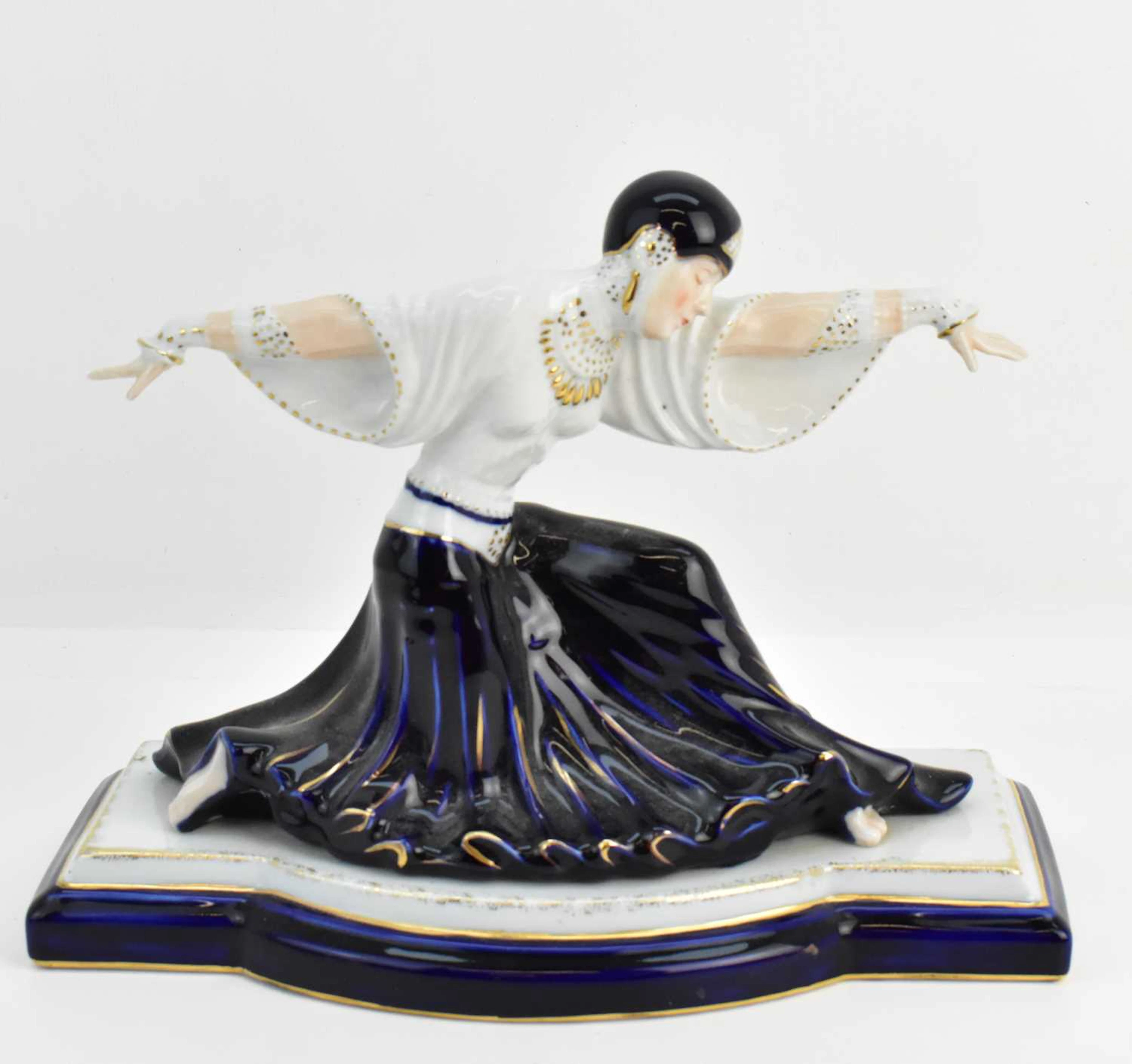 An early 20th century Art Deco porcelain figurine in the...