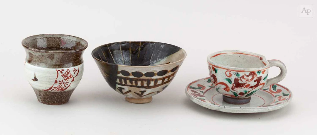 A group of probably Japanese stoneware ceramics with...