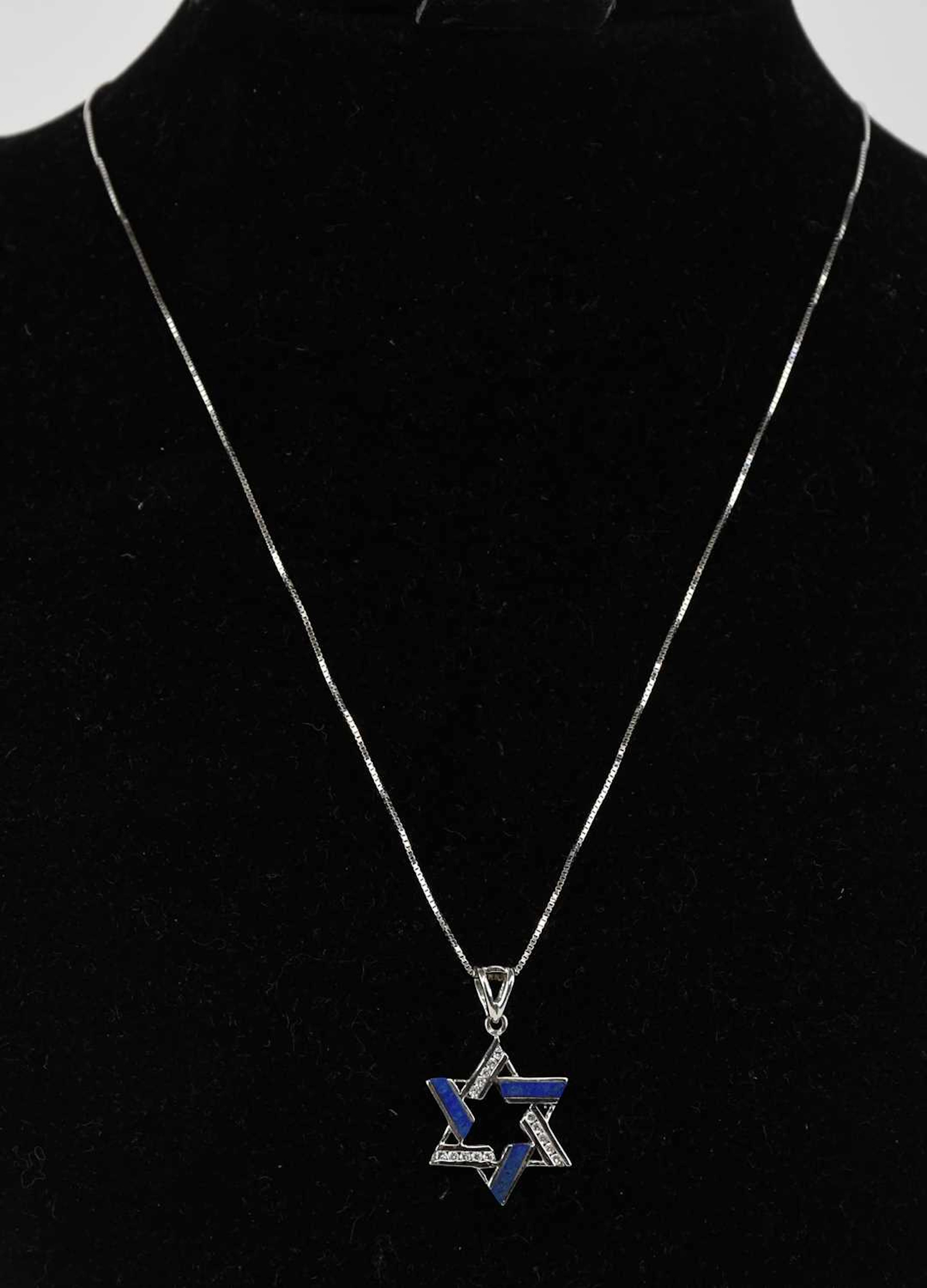 A 14ct white gold Star of David pendant