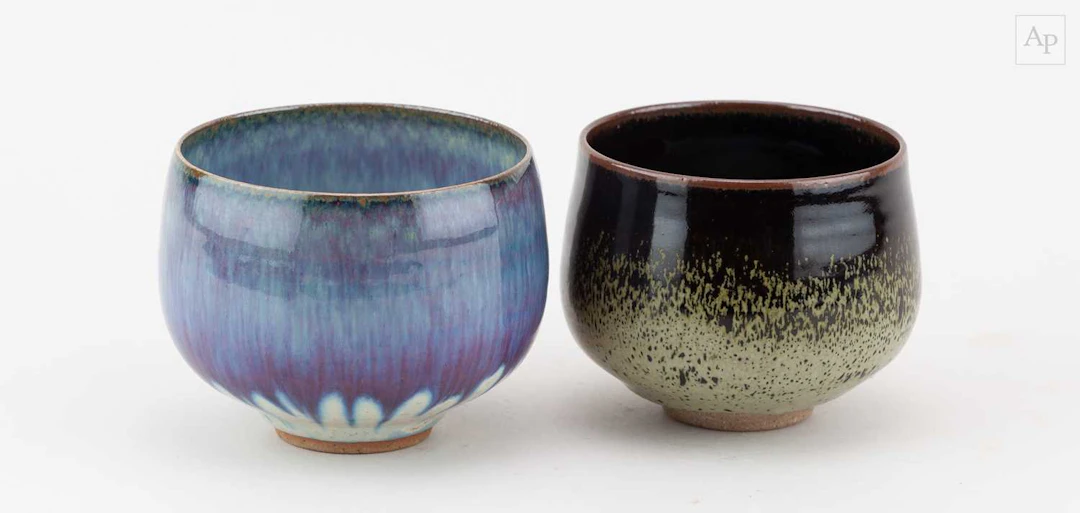 PETER SPARREY (born 1967); a stoneware bowl partially...
