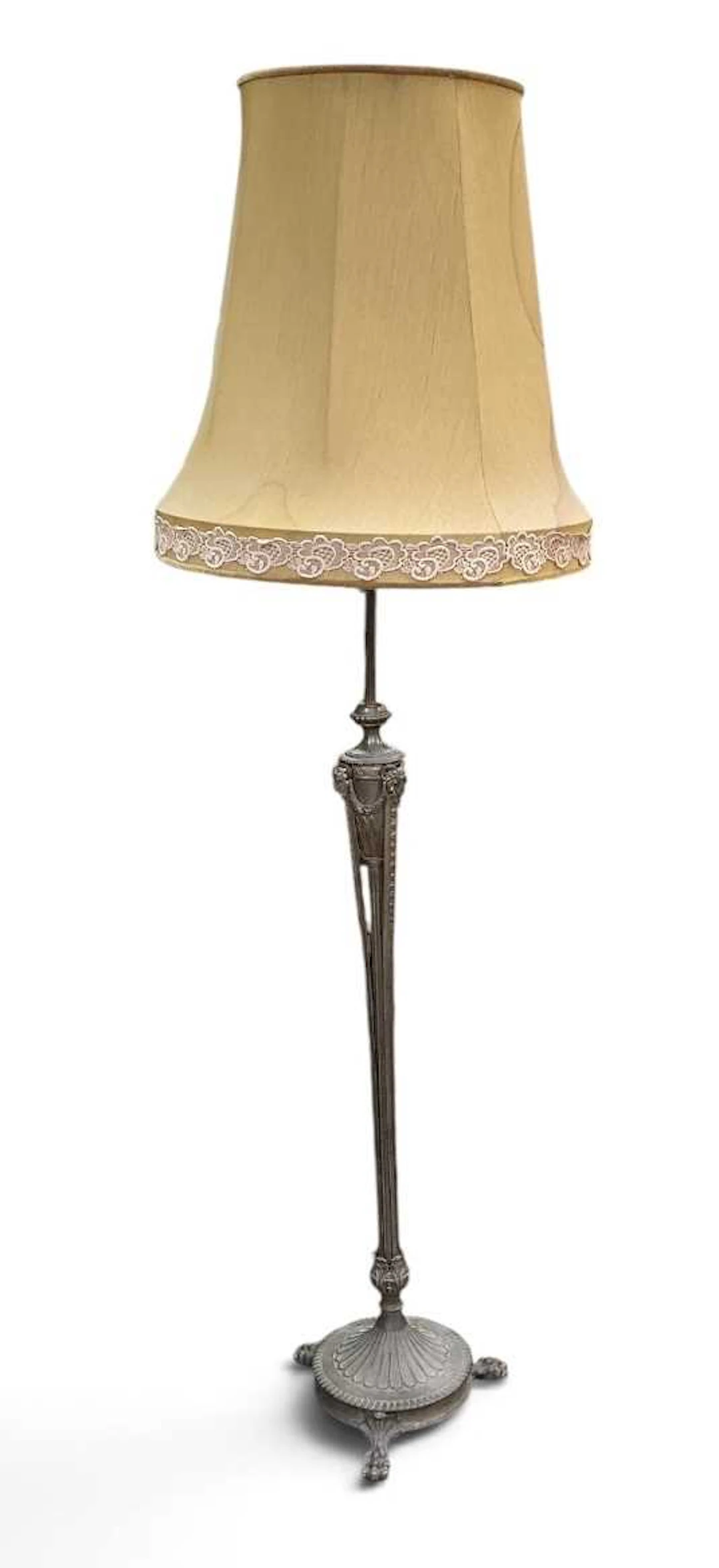 An early 20th century classical style brass three branch standard lamp