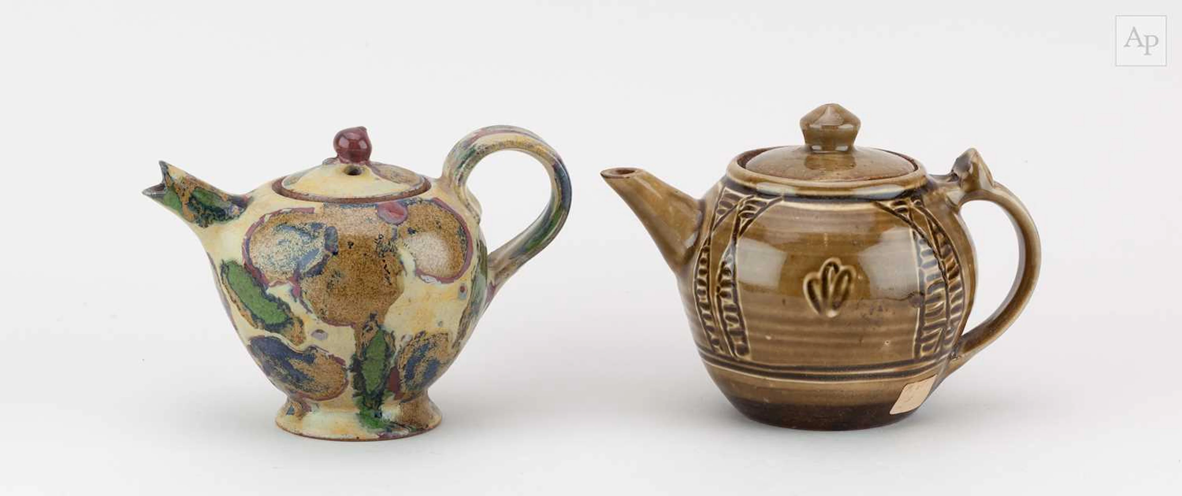 JANICE TCHALENKO (1942-2018); a small stoneware teapot covered polychrome glaze