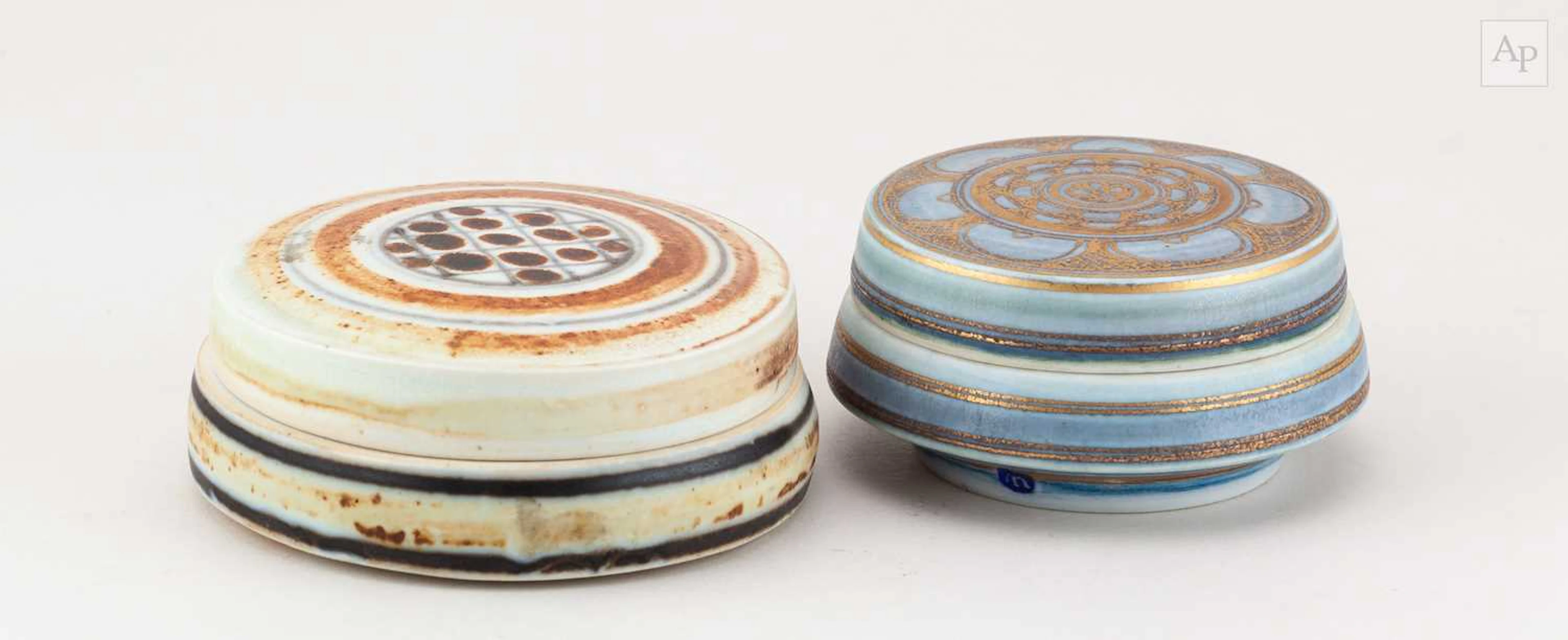 MARY RICH (1940-2022); a porcelain box with gilded geometric decoration