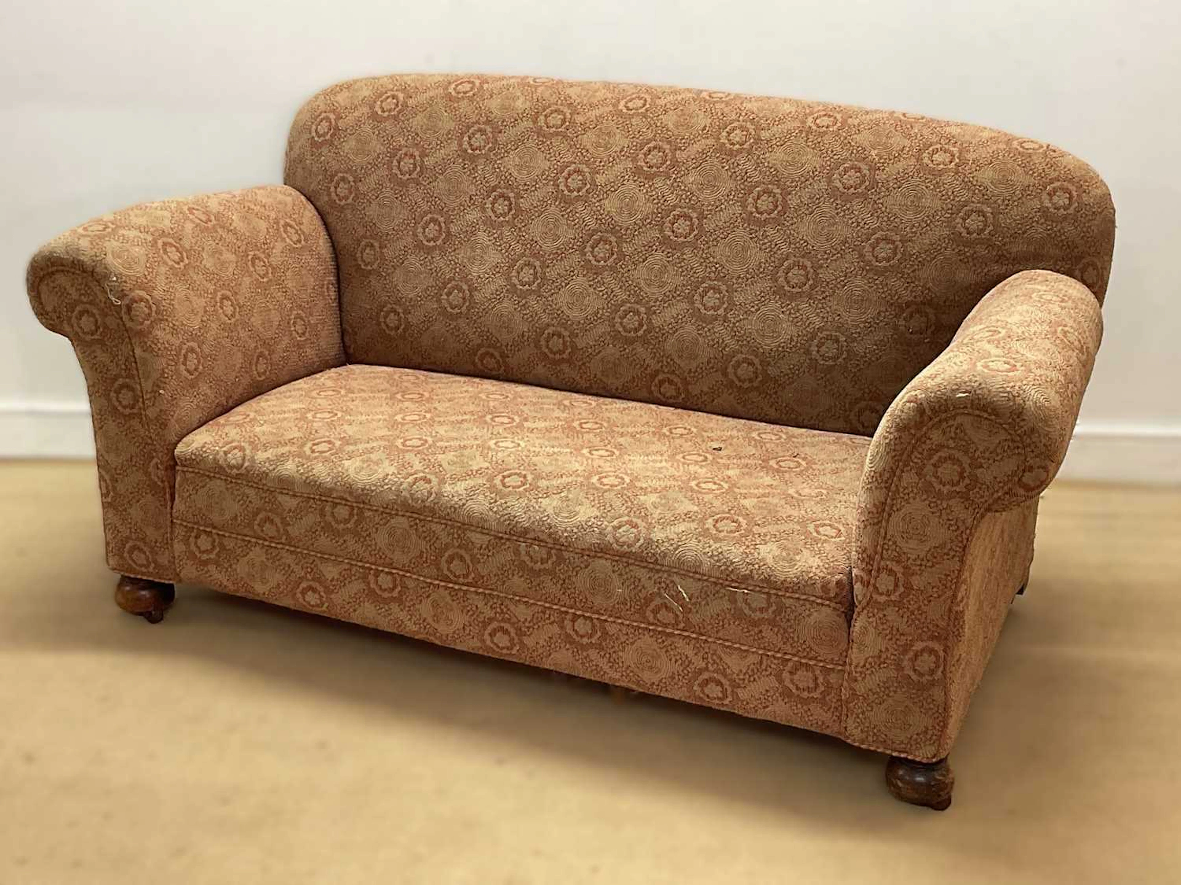 An early 20th century drop end sofa