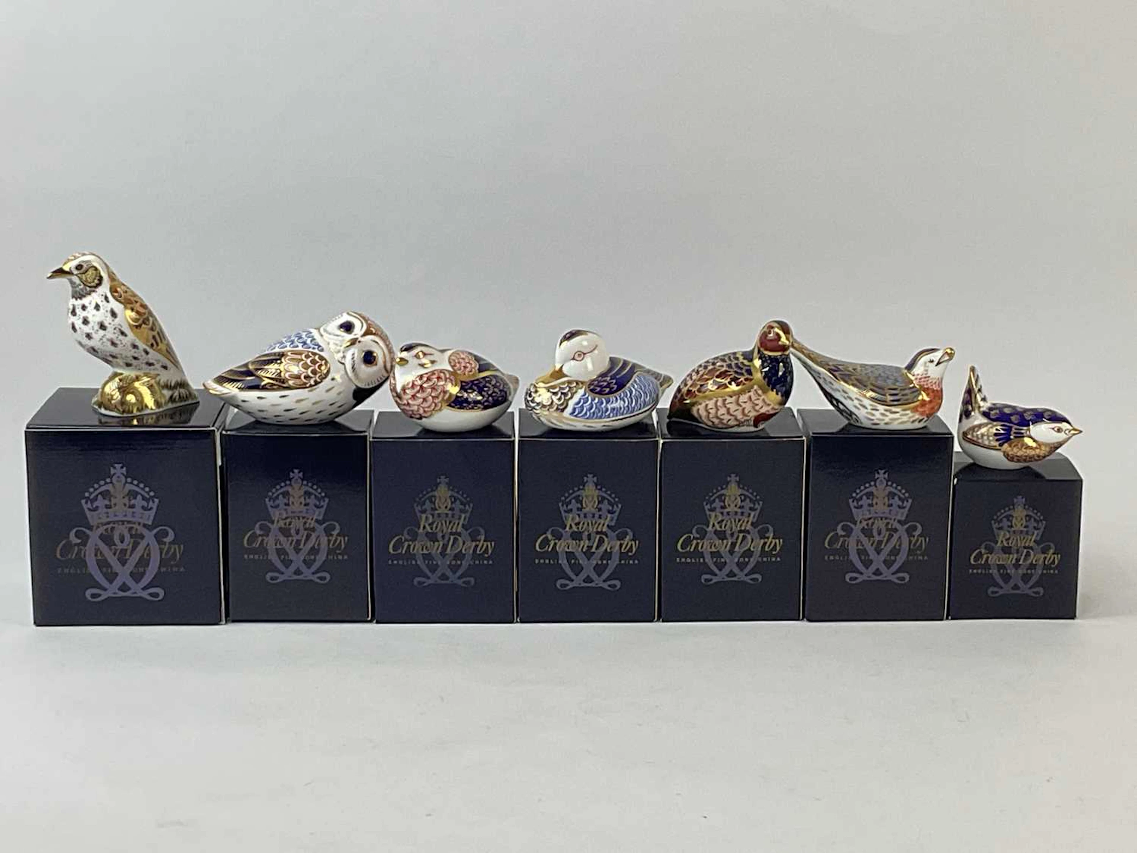 ROYAL CROWN DERBY; seven bird form paperweights