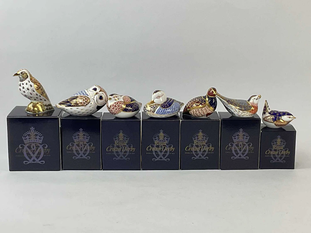 ROYAL CROWN DERBY; seven bird form paperweights