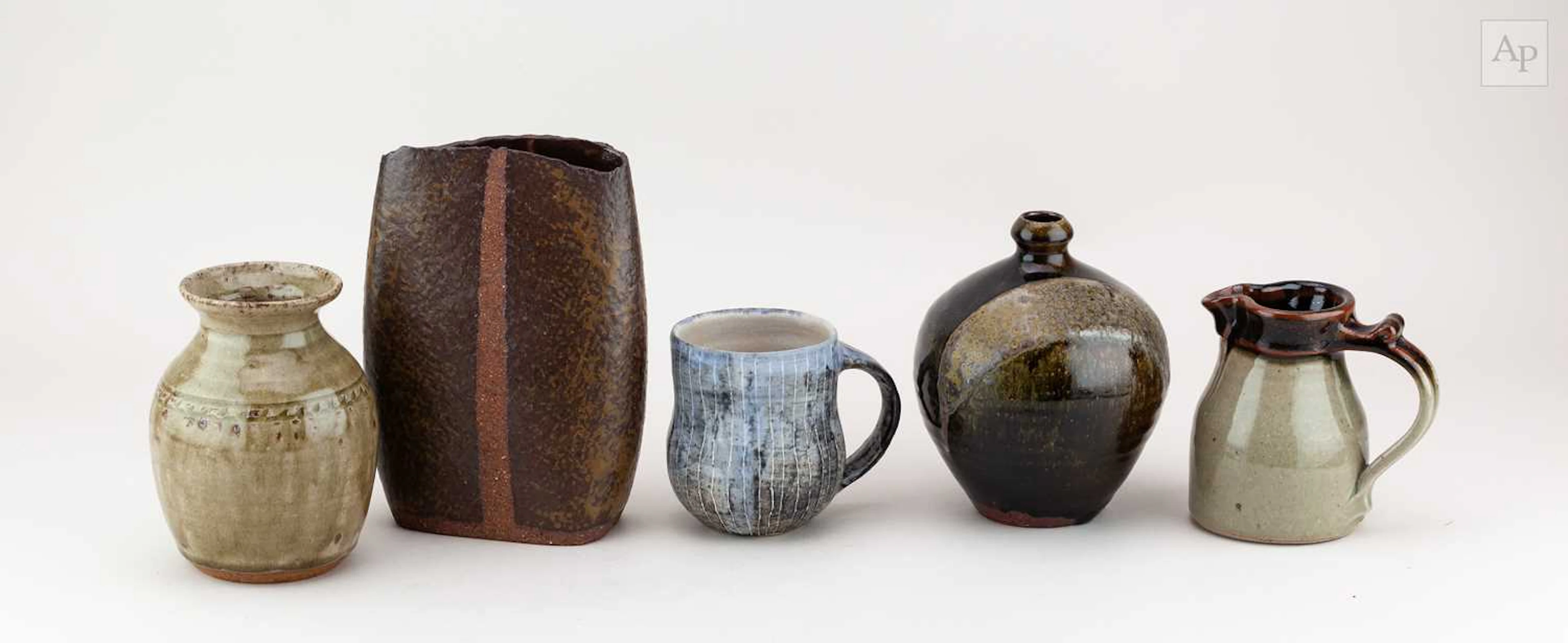 A group of stoneware ceramics by different makers comprising David Wright