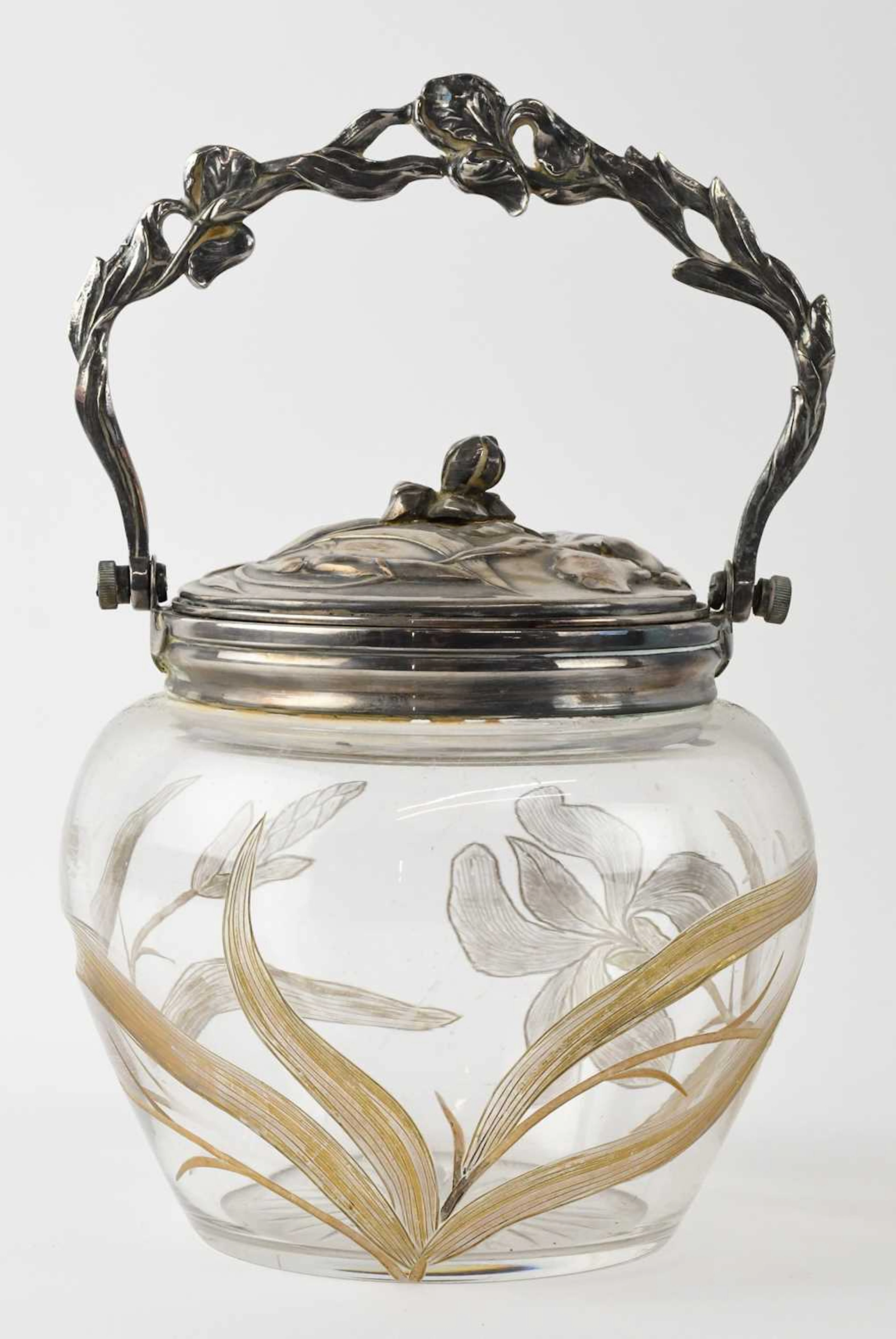 An early 20th century Art Nouveau silver plate mounted cut glass biscuit barrel