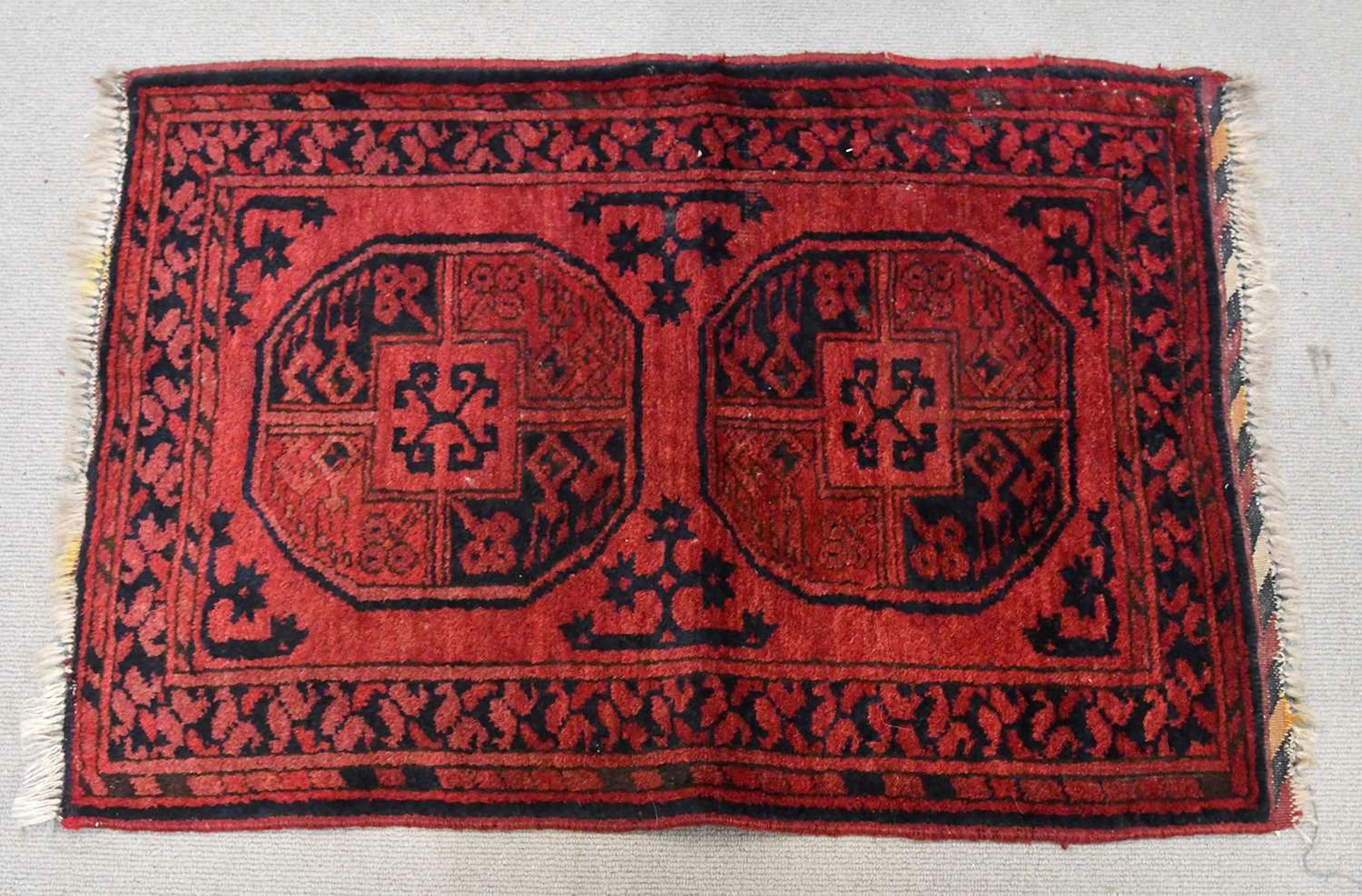 A small red ground rug