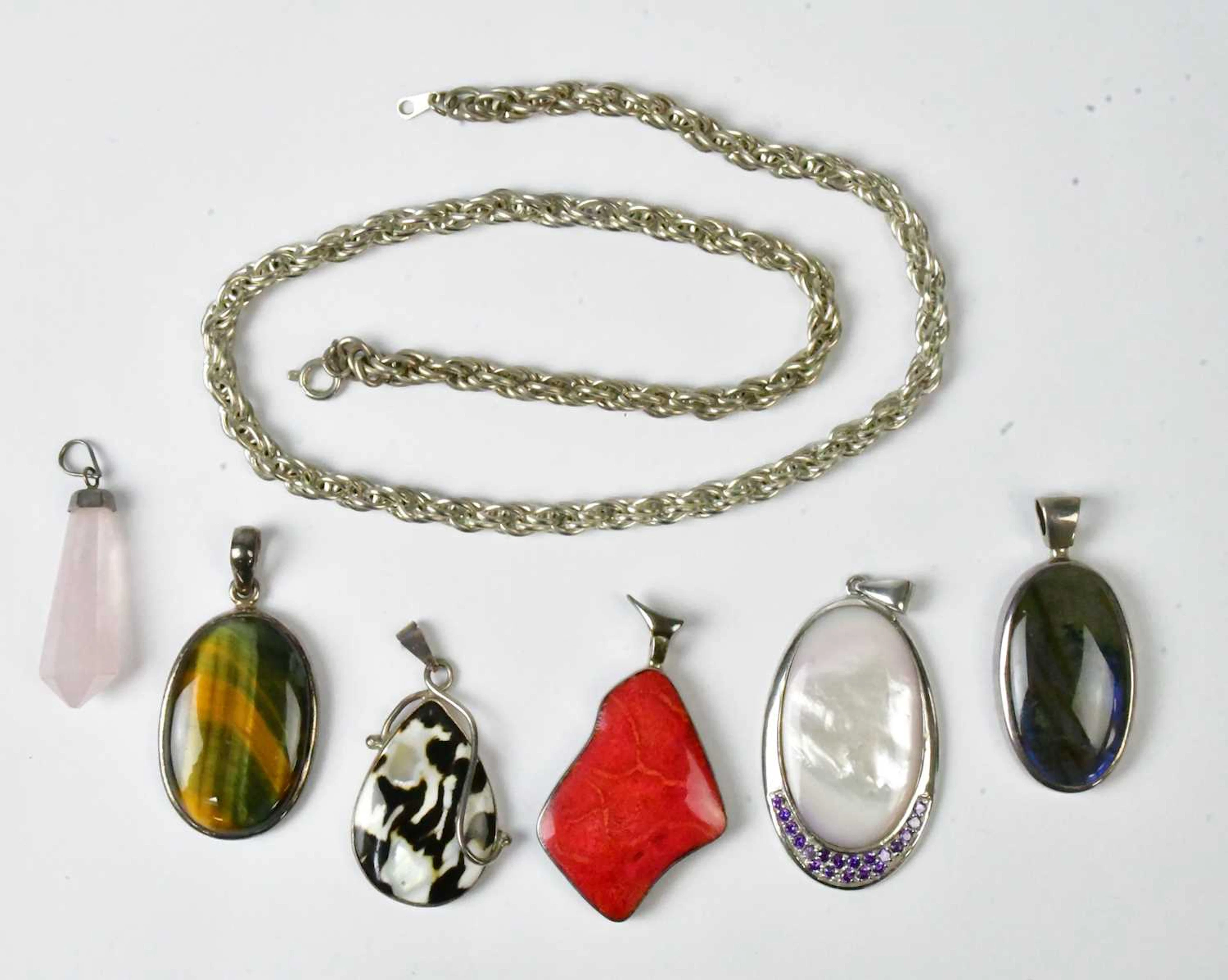 Five pendants in 925 silver mounts