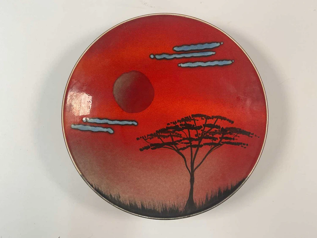 POOLE POTTERY; a decorative wall plate in the 'African Sky' design