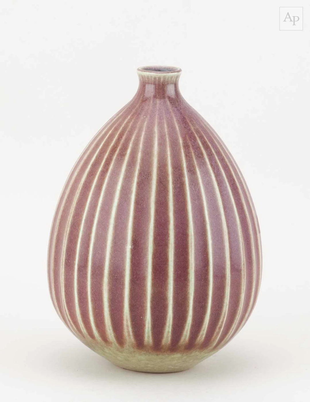 PETER LANE (born 1932); a fluted porcelain bottle...
