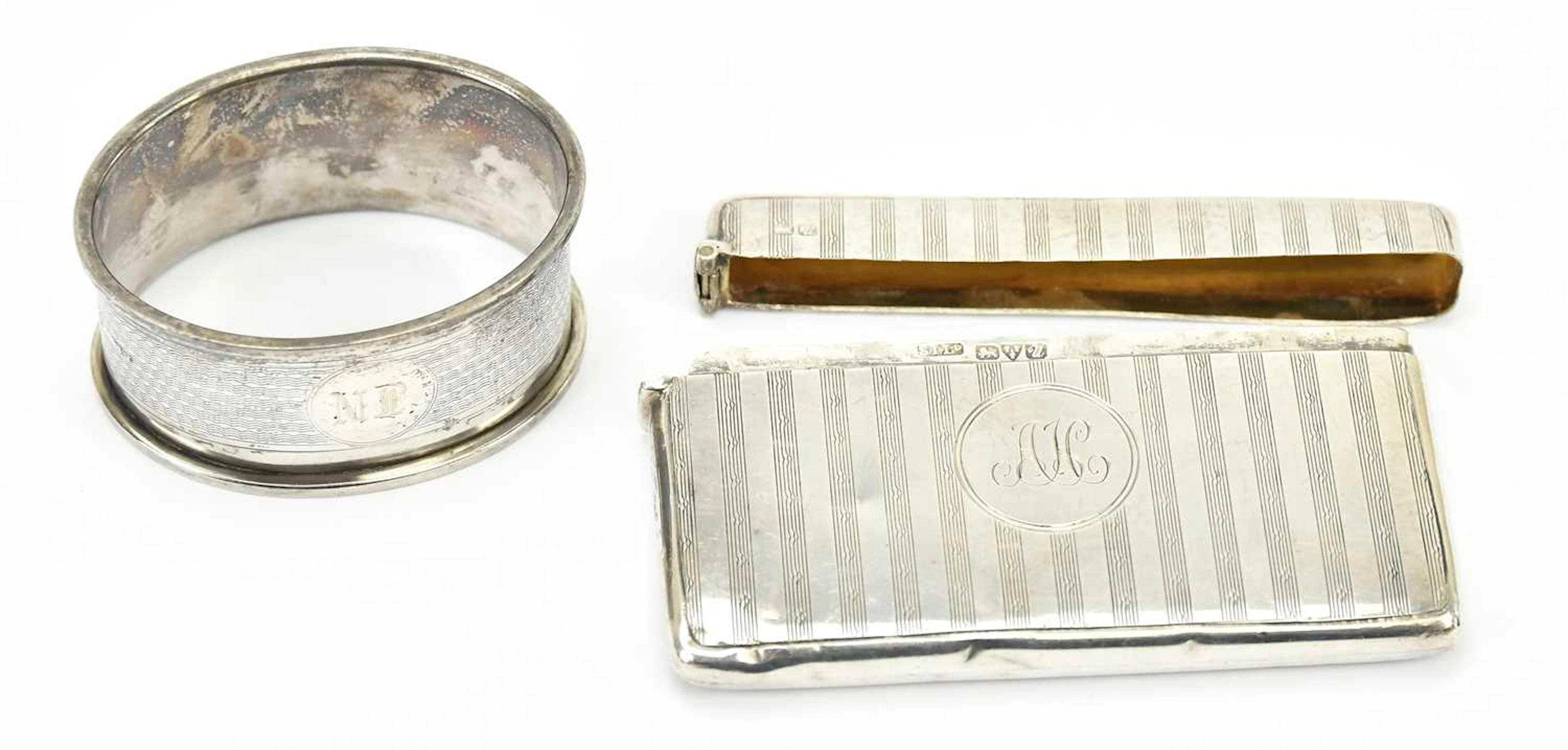 STOKES & IRELAND; a George V hallmarked silver card case (af)
