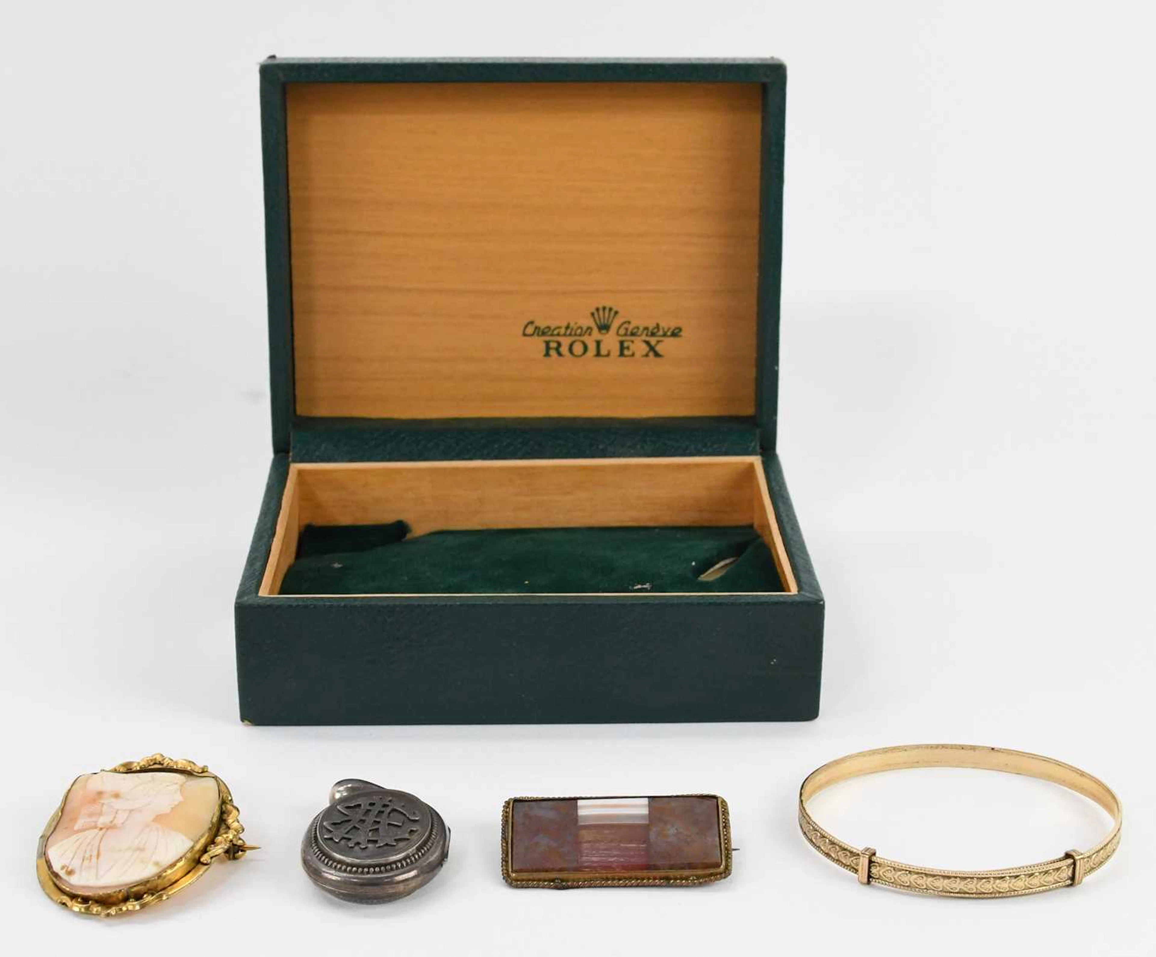 ROLEX; a vintage green leather effect Rolex watch box for...