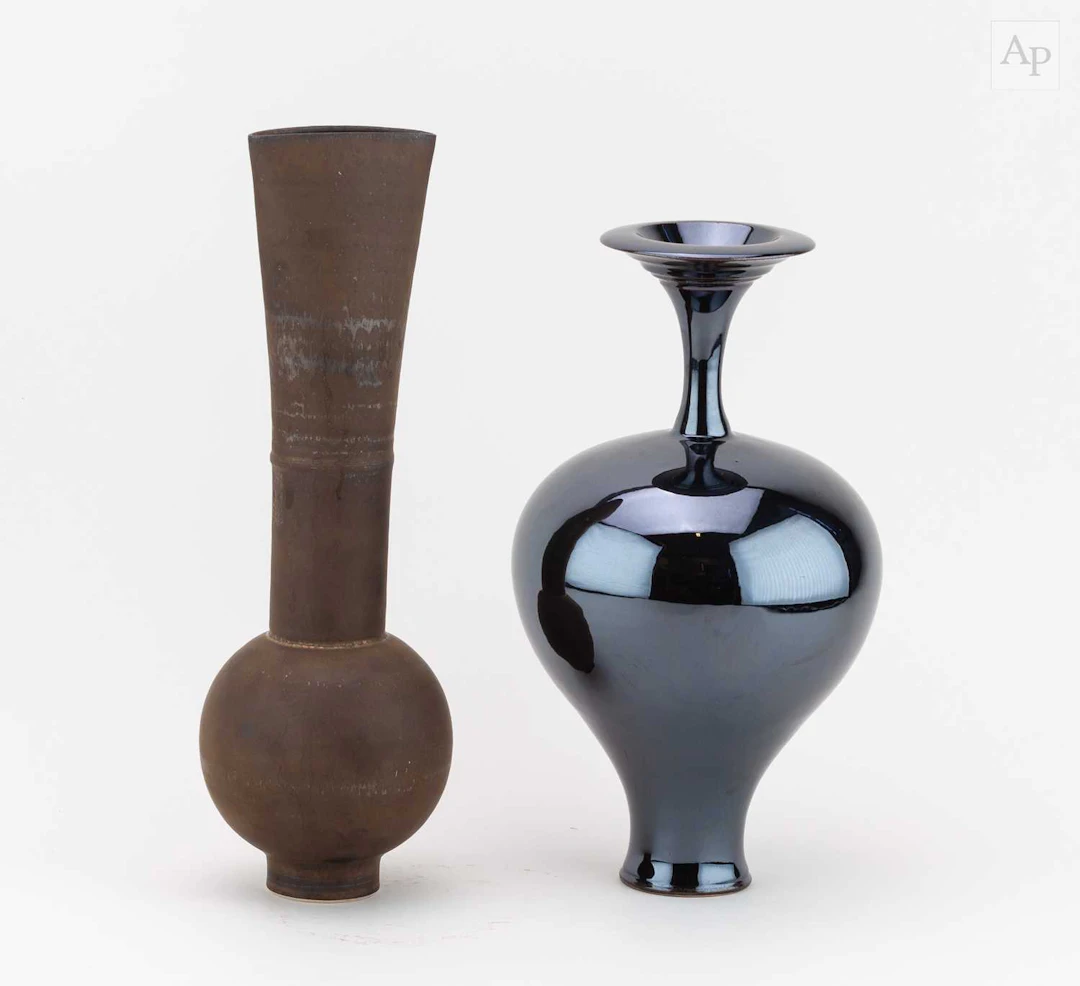 IAN RYLATT (born 1963); a porcelain vase with tall...
