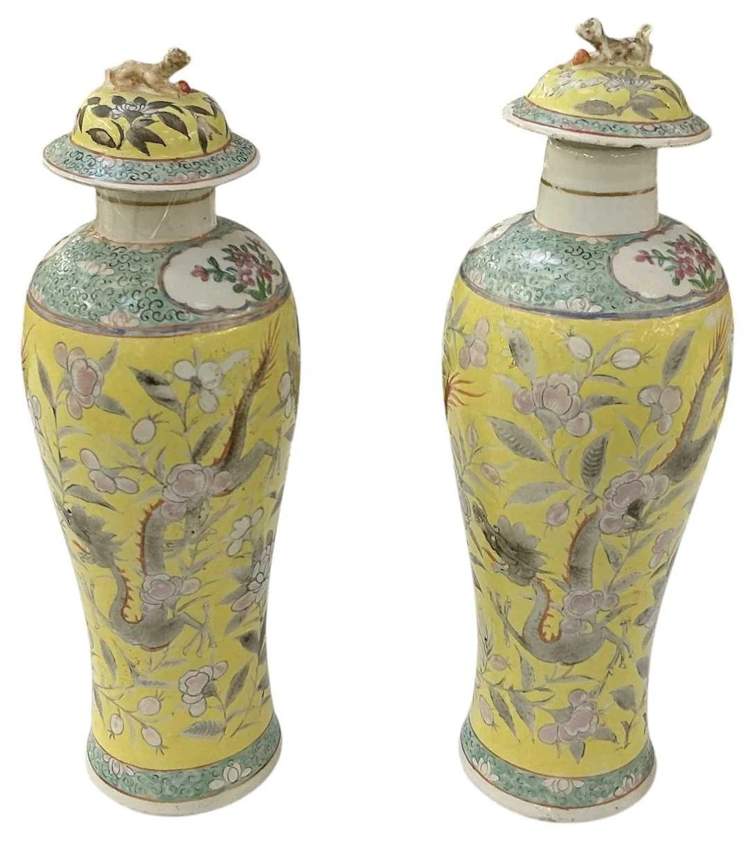 A pair of 19th century Chinese hand painted yellow ground porcelain lidded urns