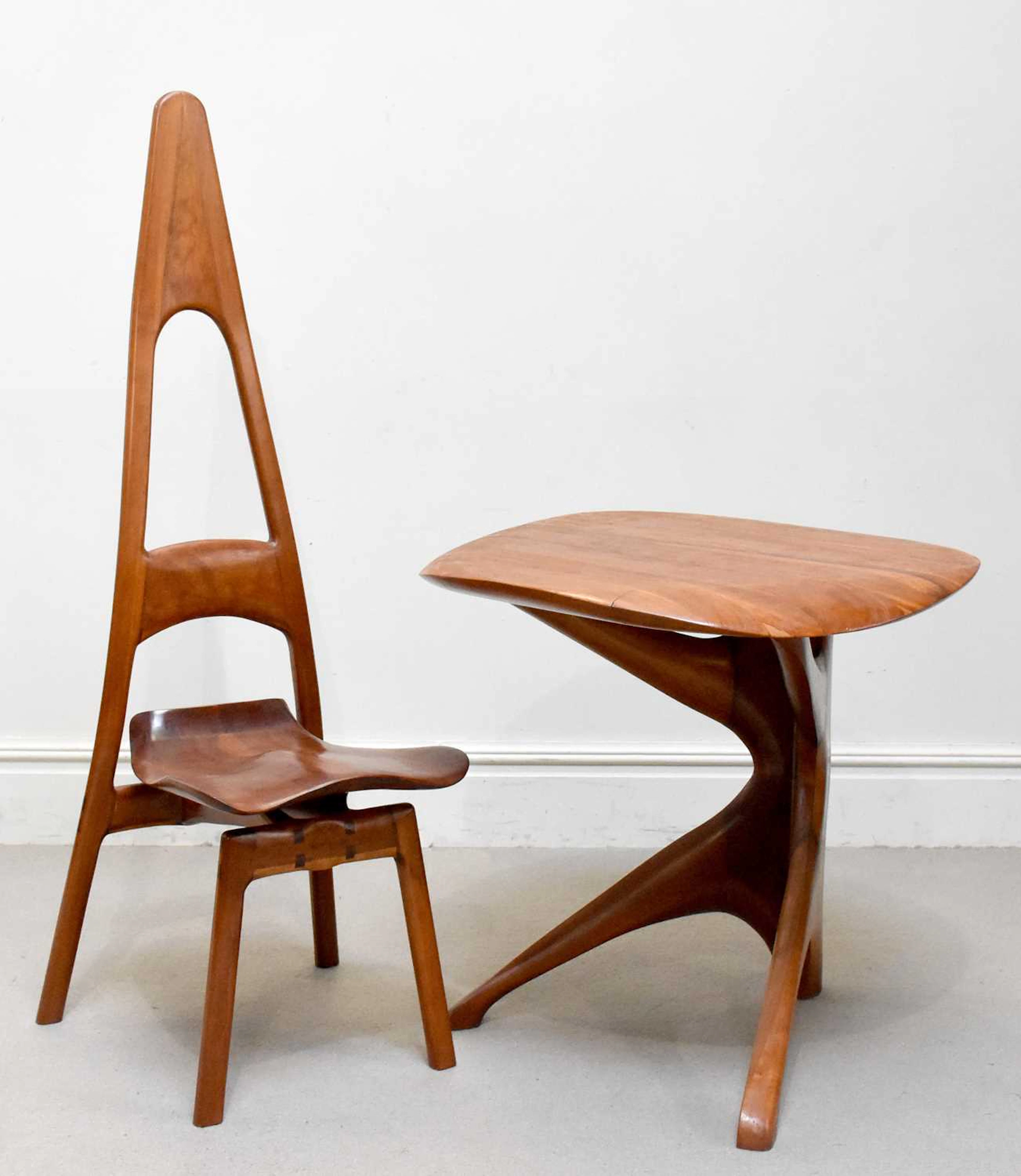 A unique and important handmade cherry wood desk and high back chair