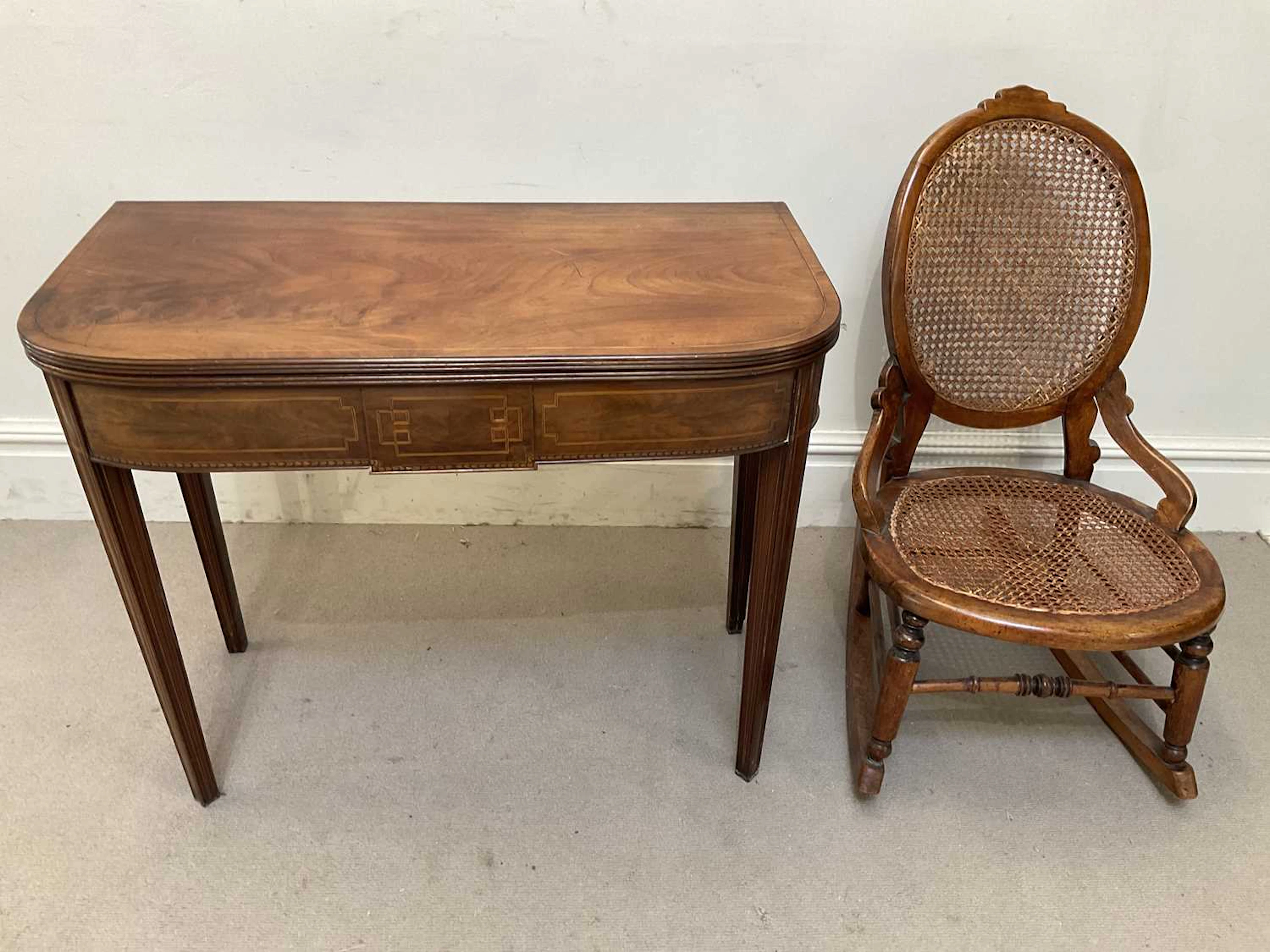 A 19th century mahogany ‘D’ shaped tea table