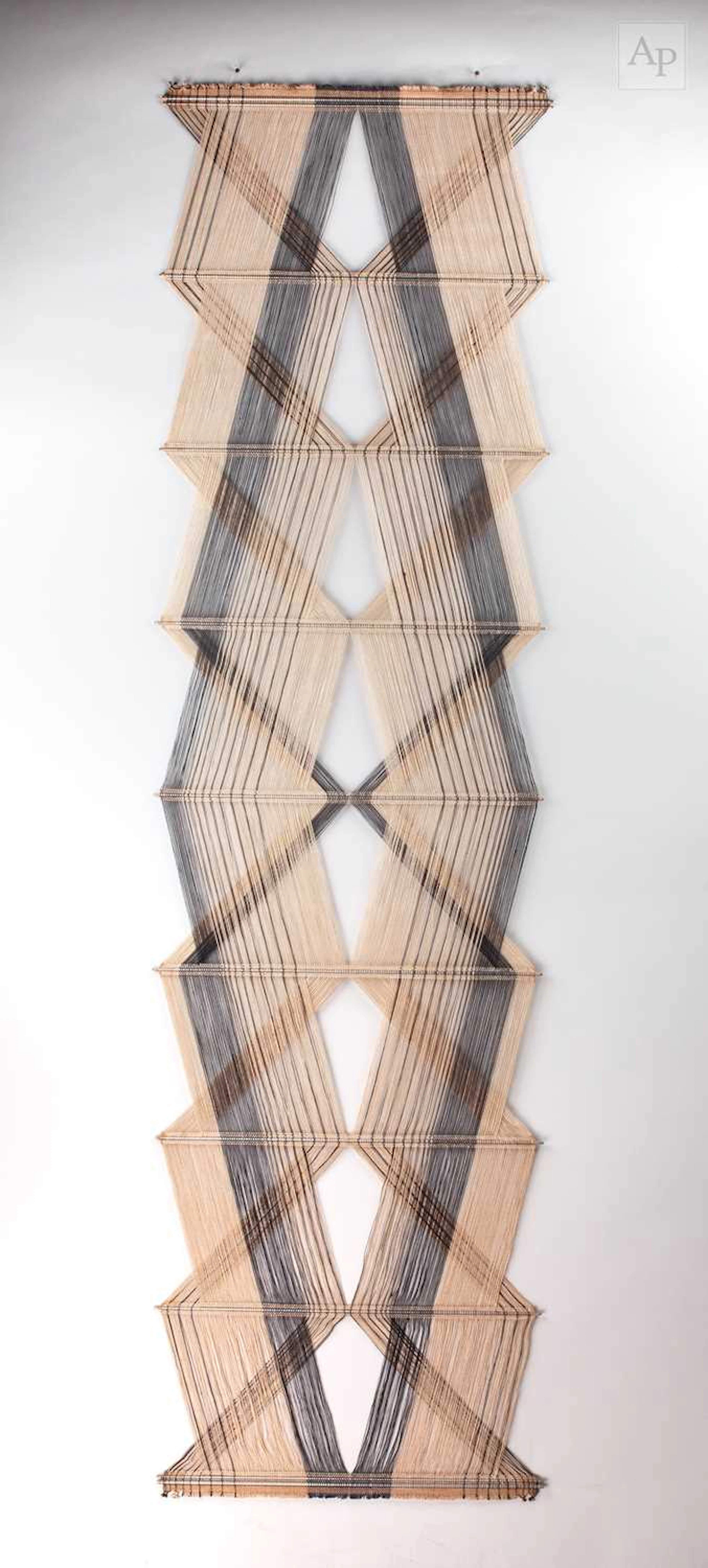 PETER COLLINGWOOD (1922-2008); a beige and black macrogauze hanging