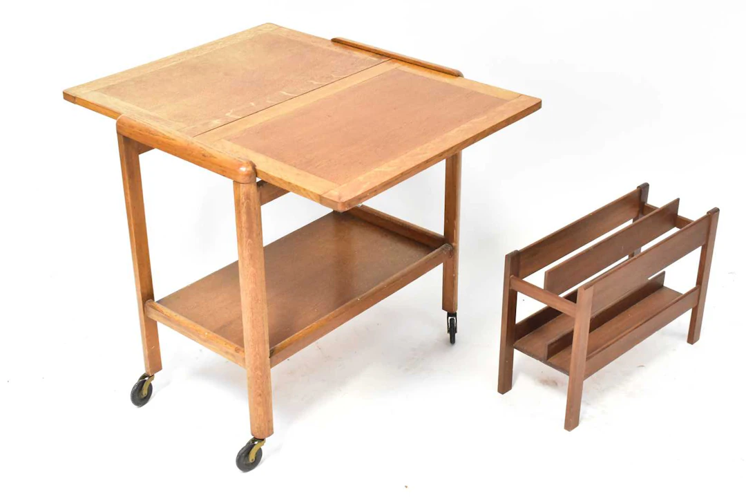 A mid-20th century oak two-tiered tea trolley