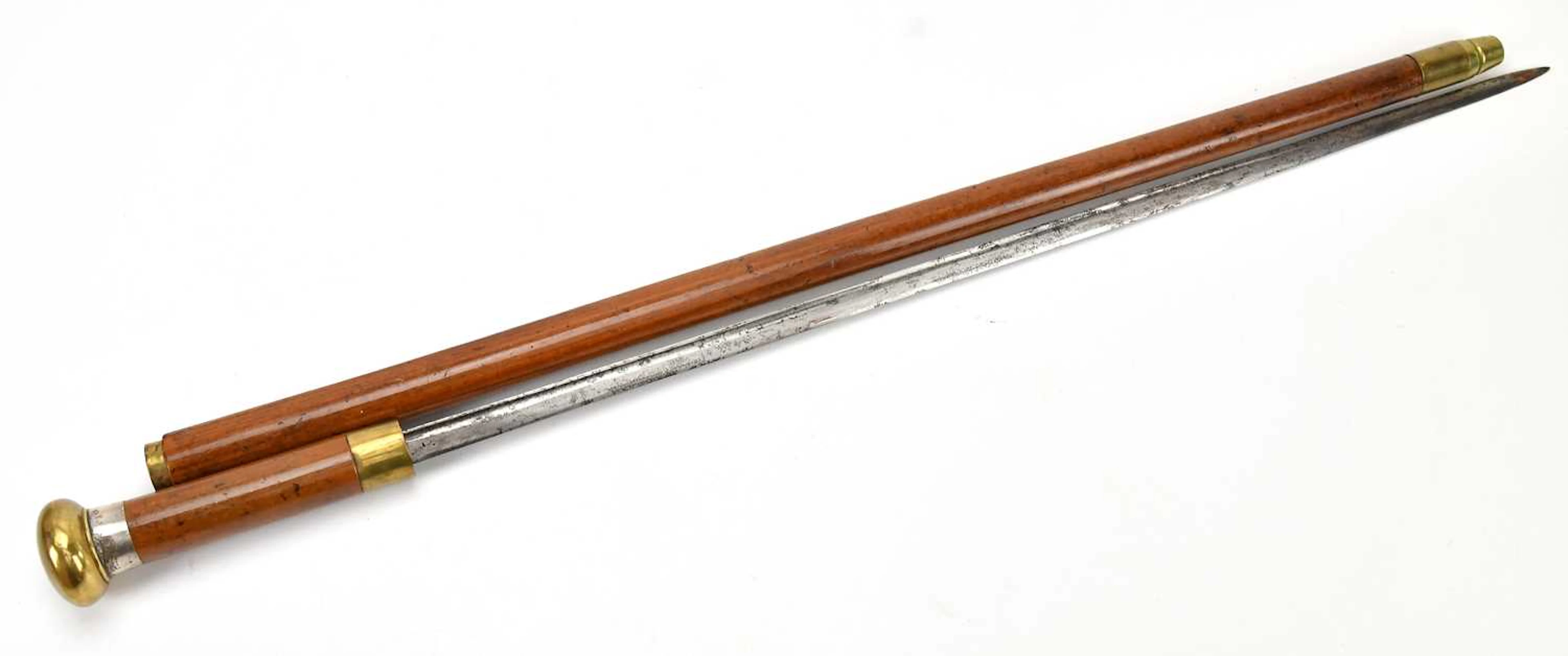 A late 19th century swordstick with brass cap and bamboo scabbard