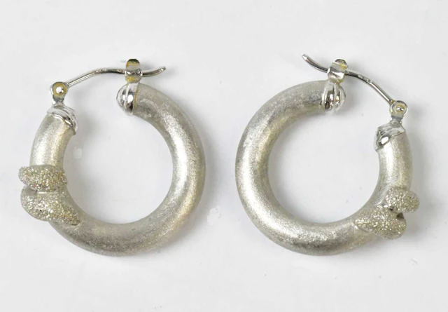A pair of 18ct white gold hoop earrings with brushed texture