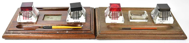 A near pair of Art Deco stained wood ink stands