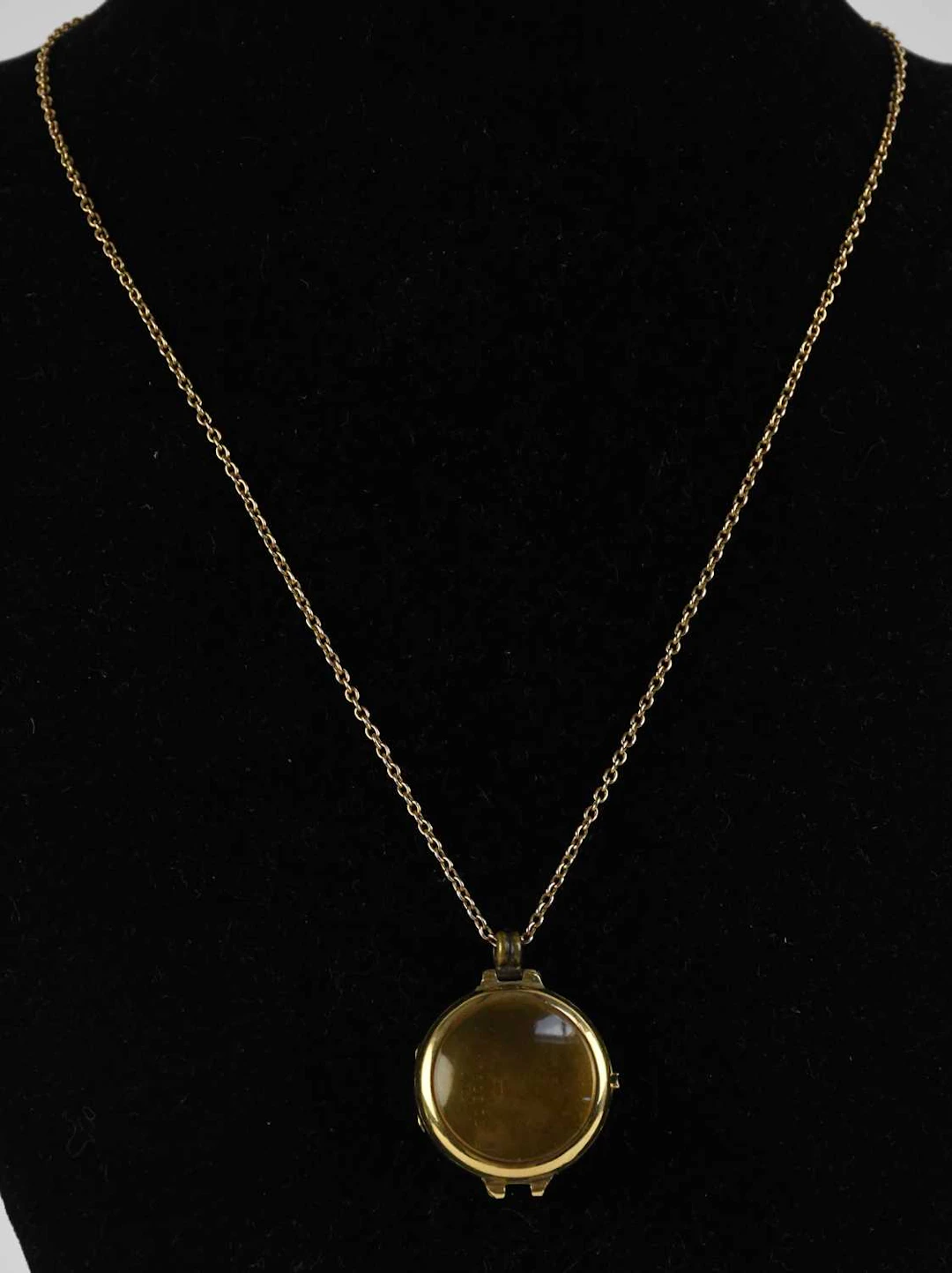 An 18ct yellow gold wristwatch head converted to pendant