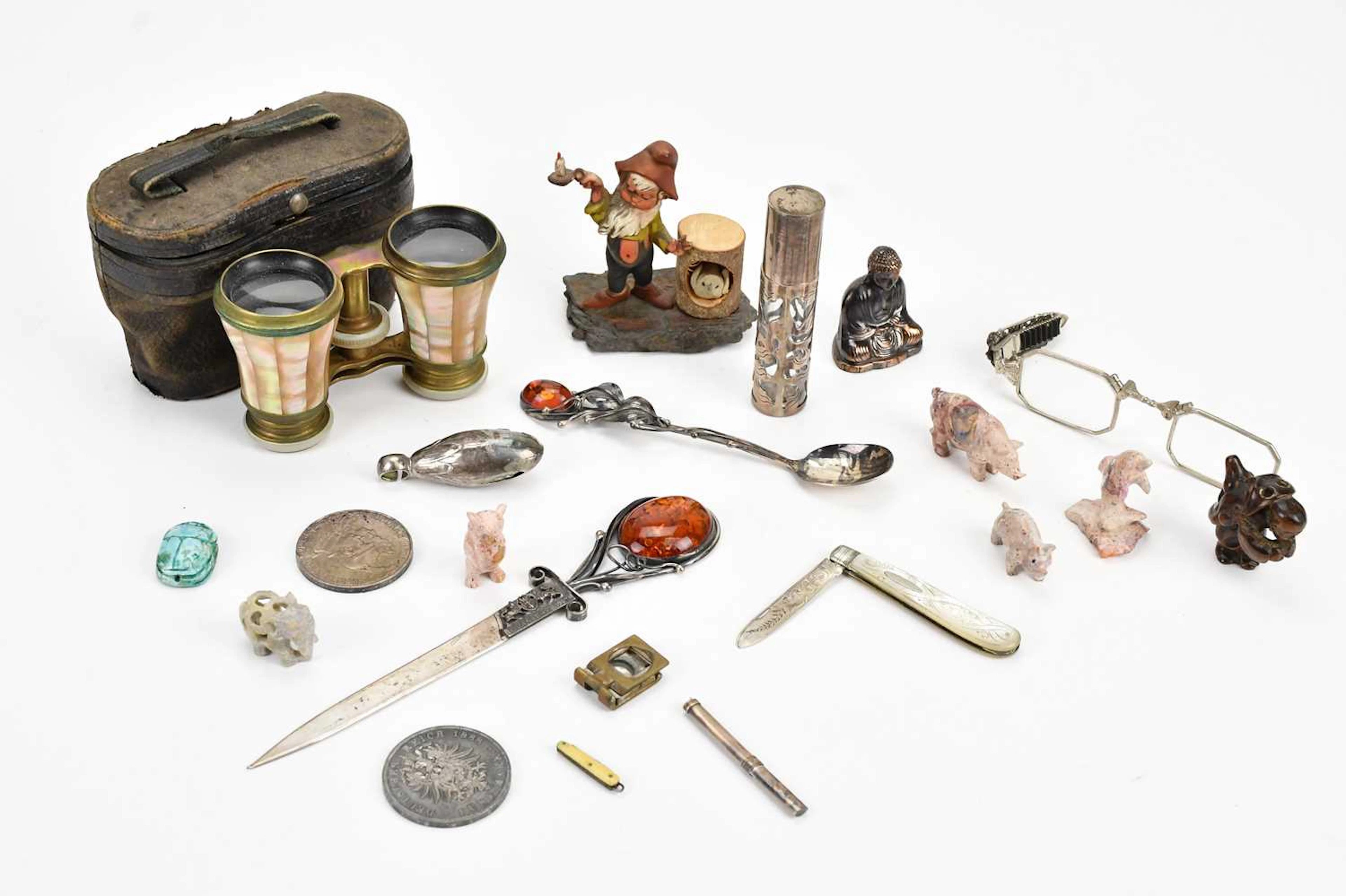 An assortment of collectors' items including white metal mounted perfume bottle