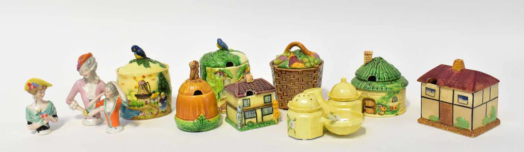 A collection of mid-20th century jam pots