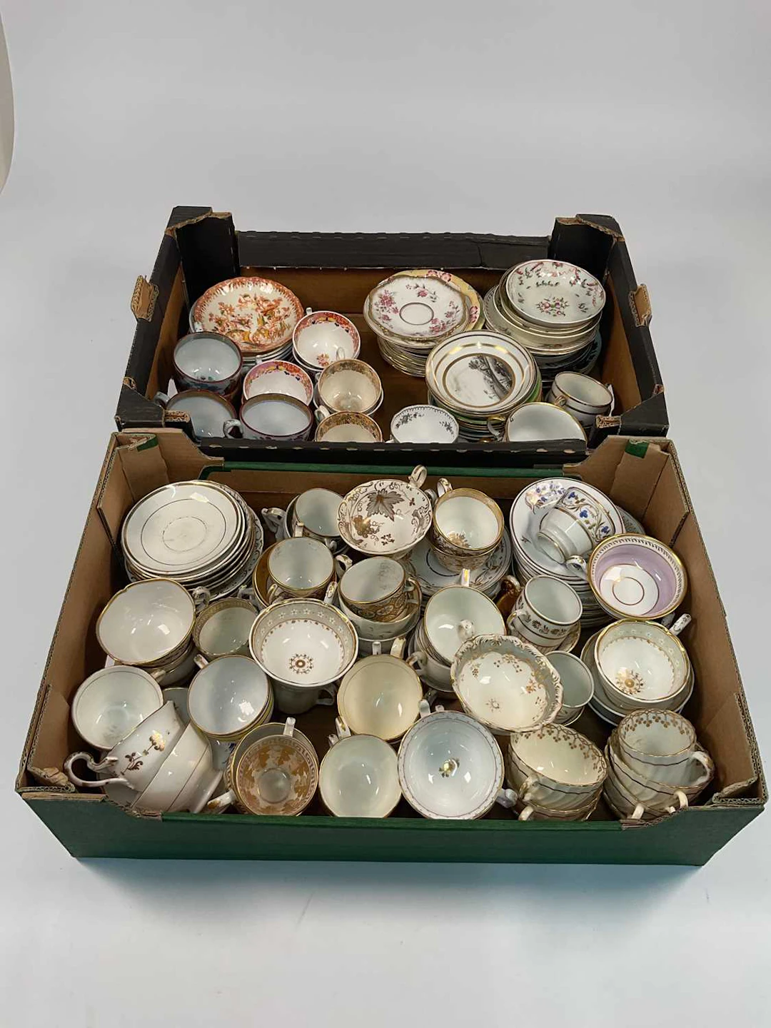 A quantity of 19th and 20th century porcelain teacups and saucers
