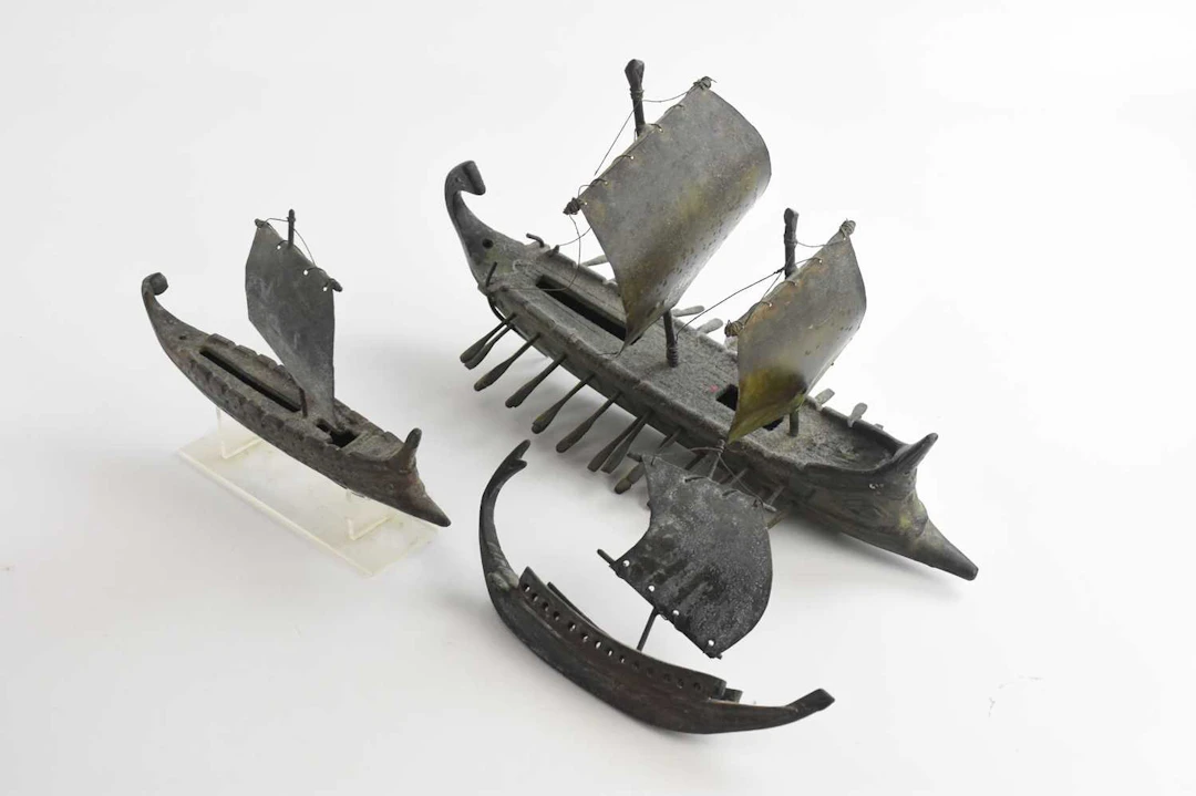 A bronze figure of a Greek bireme