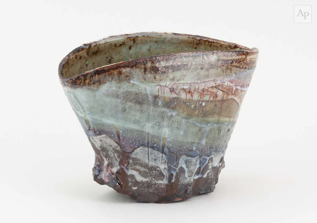 MARGARET CURTIS (born 1955); a flattened stoneware vessel...