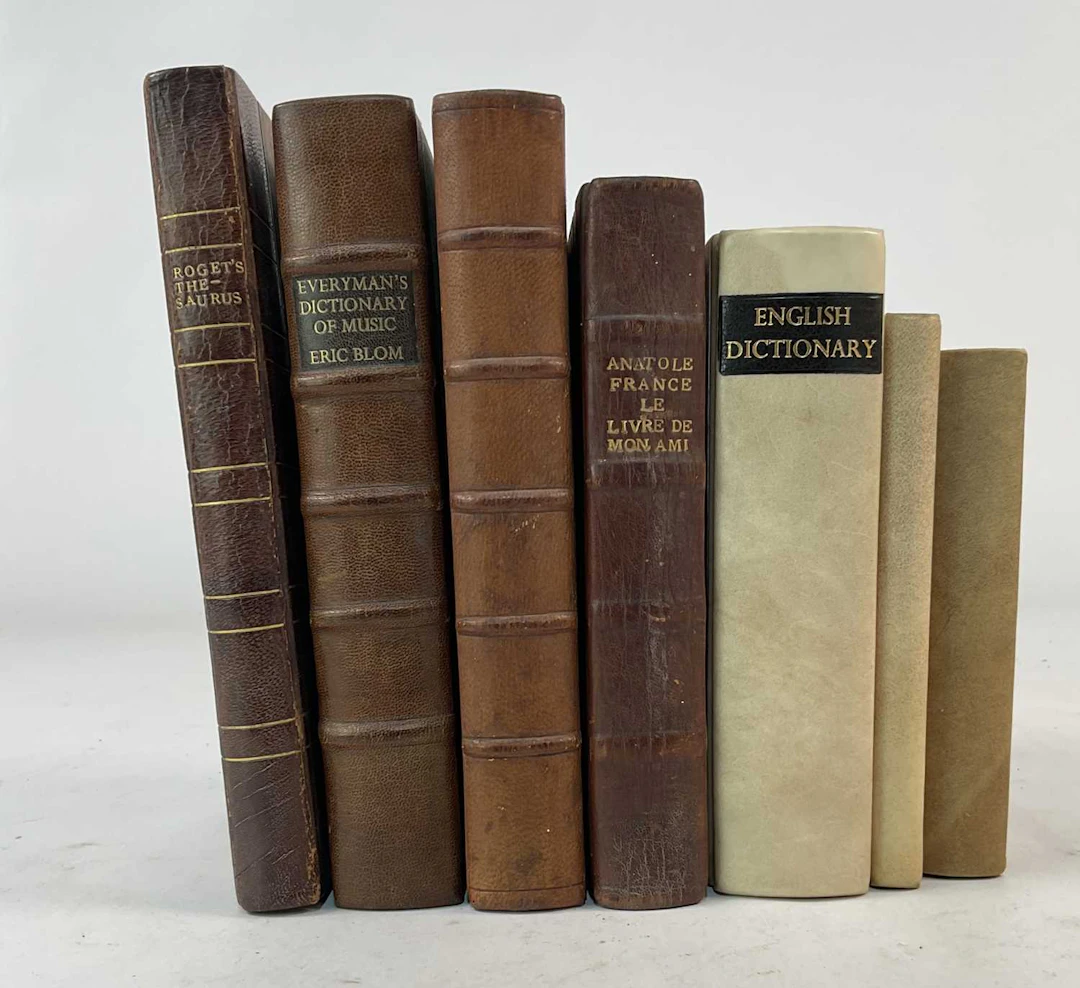 A collection of seven books rebound by the Cockerell bindery to include