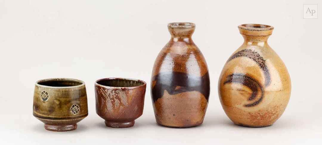 JOHN WEBB; two salt glazed bottles