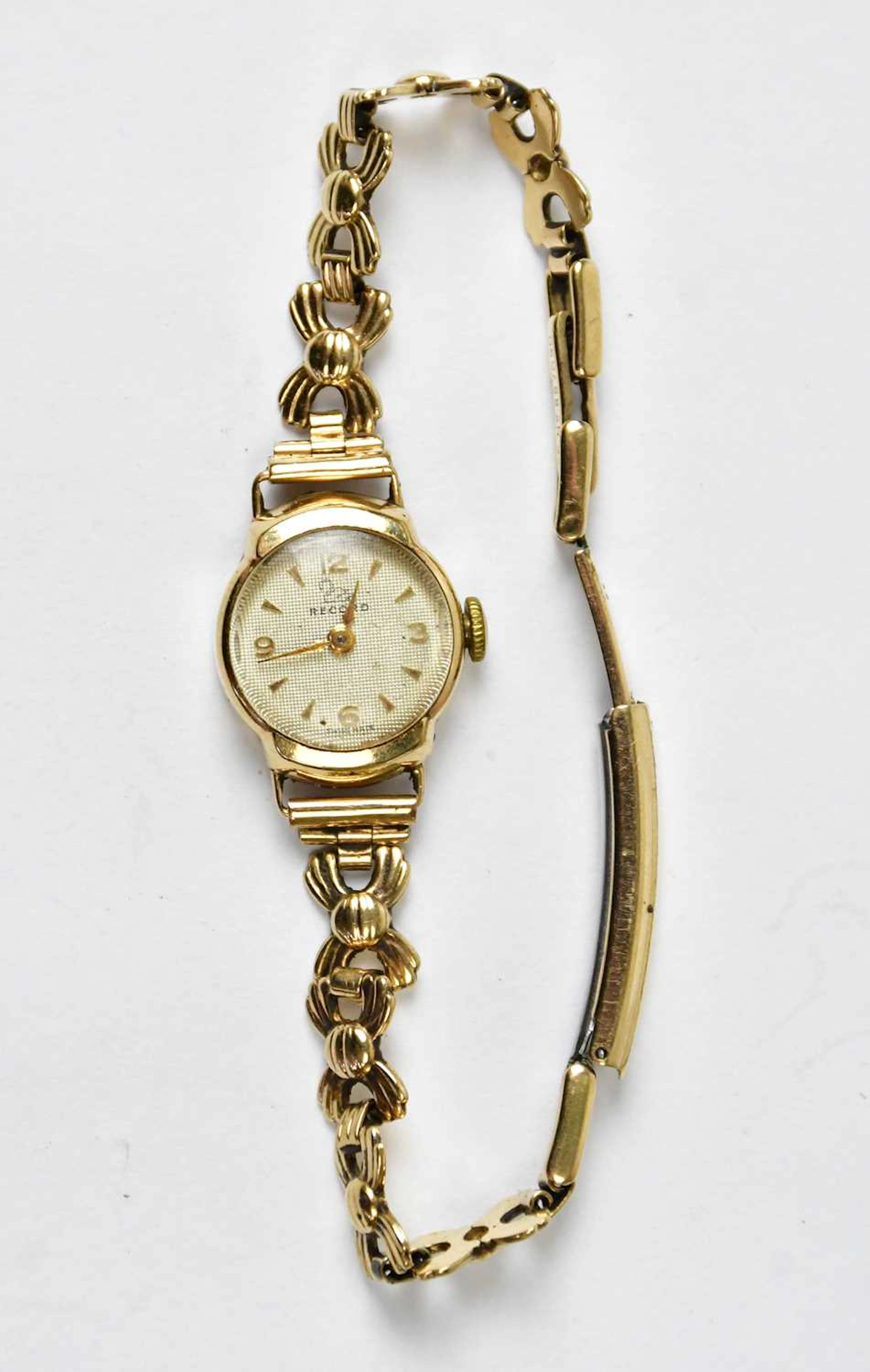RECORD; a 1950s 9ct yellow gold cocktail watch