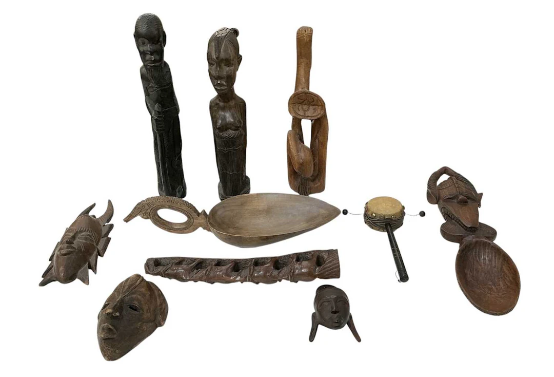 A quantity of assorted African carved wooden tribal figures and bowls